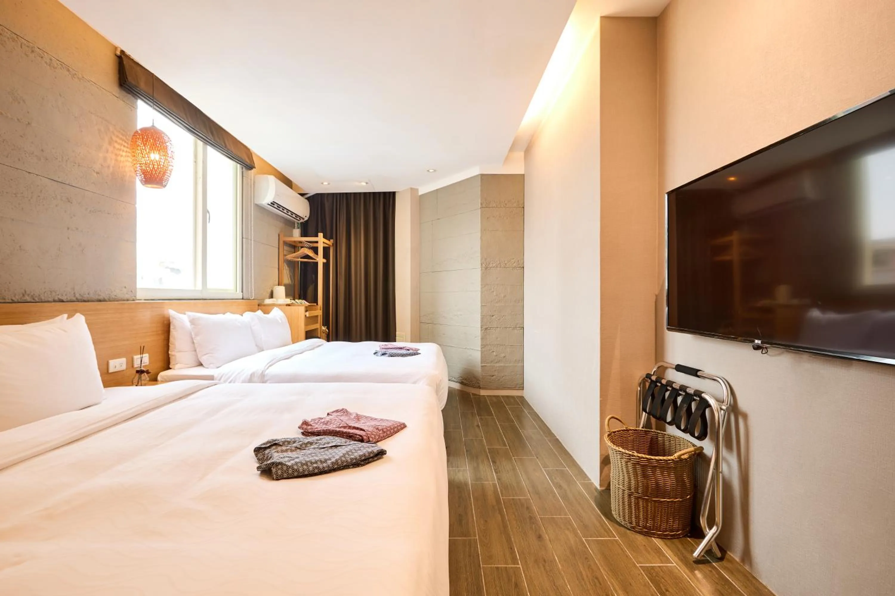 Bed in Tenlien onsen Hot Spring Hotel