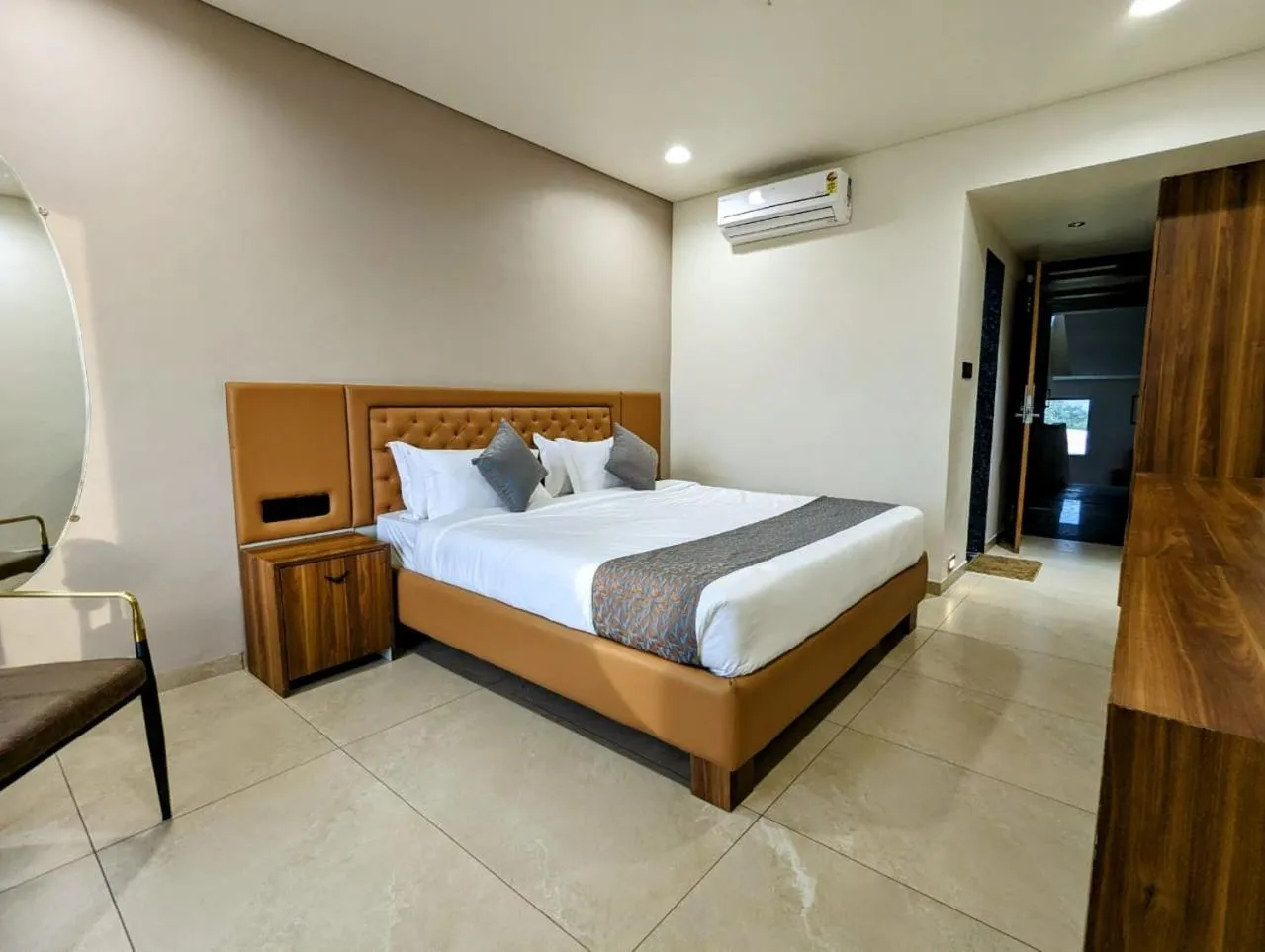 Bed in Hotel Majestic By NxtJen Hospitality