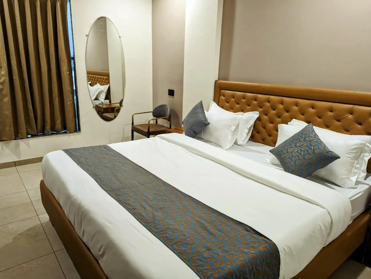 Bed in Hotel Majestic By NxtJen Hospitality