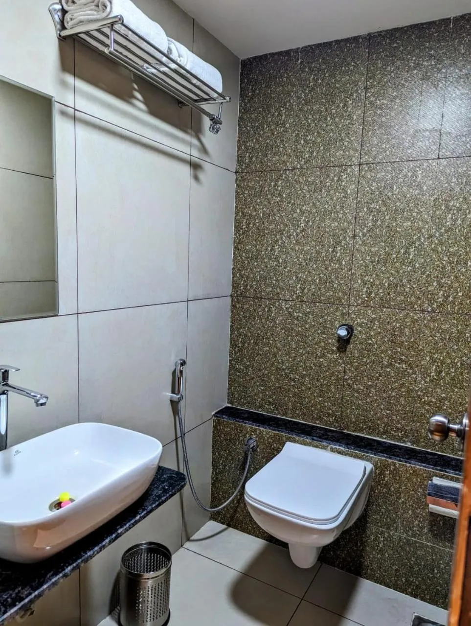 Toilet in Hotel Majestic By NxtJen Hospitality