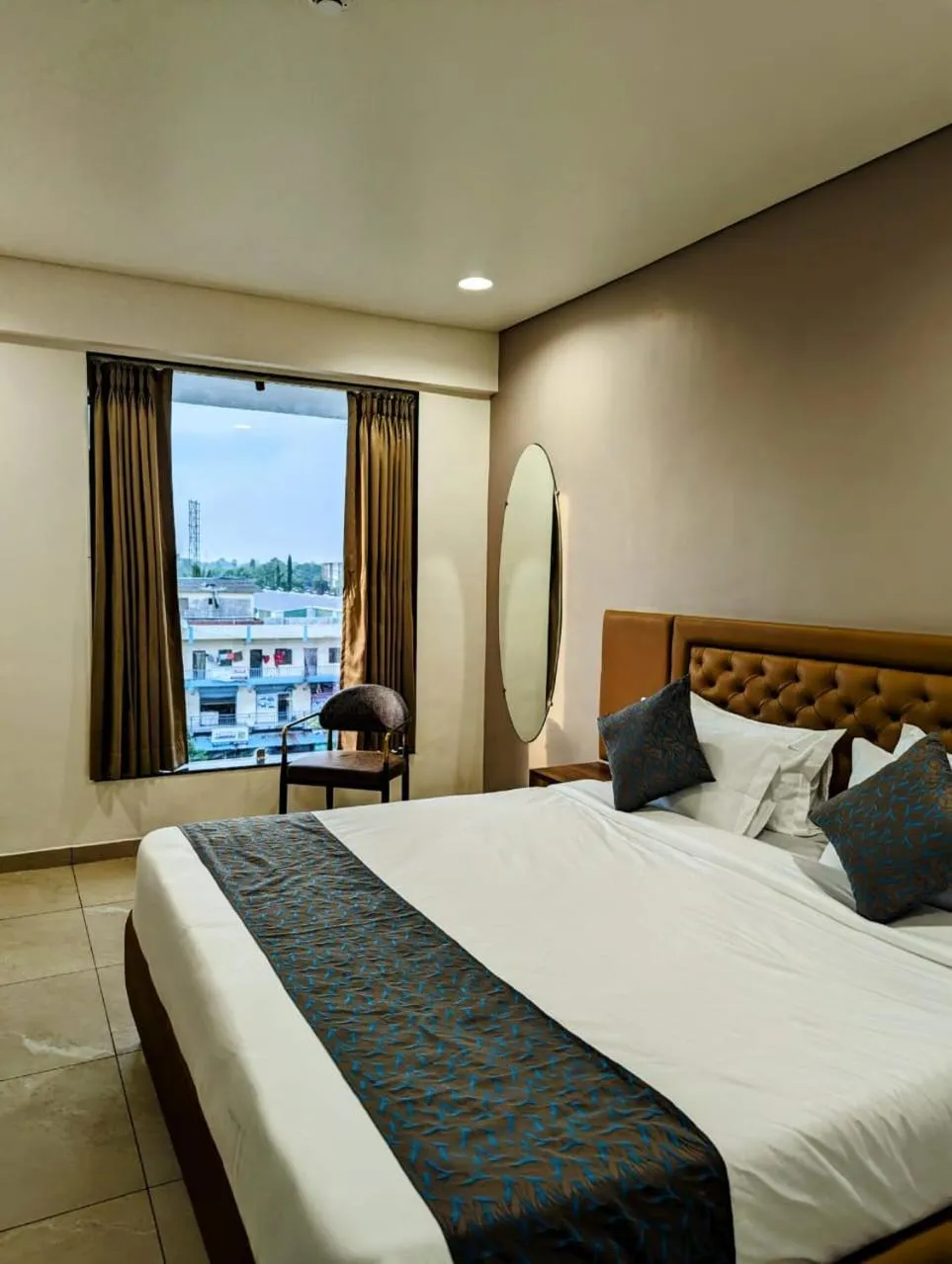 Bed in Hotel Majestic By NxtJen Hospitality