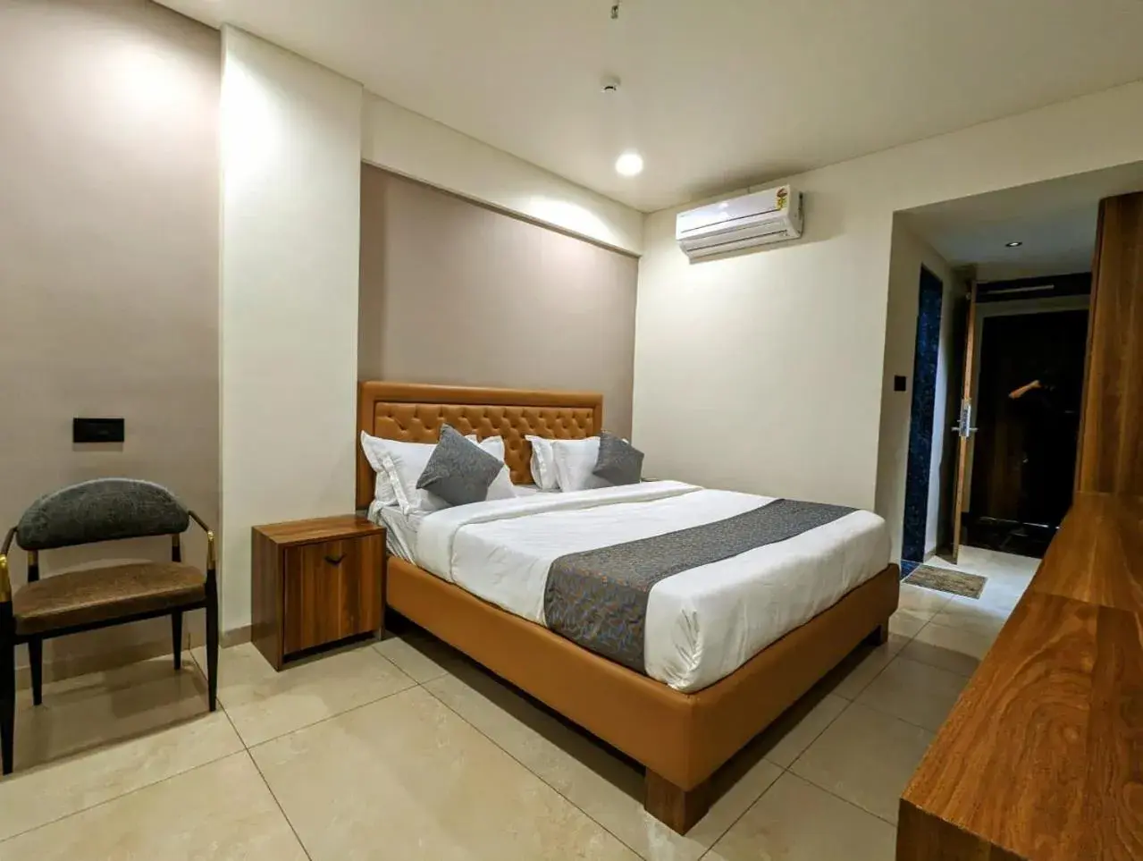 Bed in Hotel Majestic By NxtJen Hospitality Bed in Hotel Majestic By NxtJen Hospitality