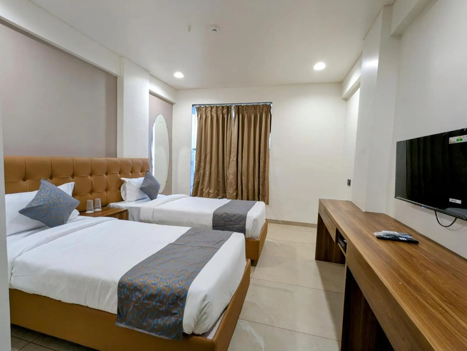 Bed in Hotel Majestic By NxtJen Hospitality