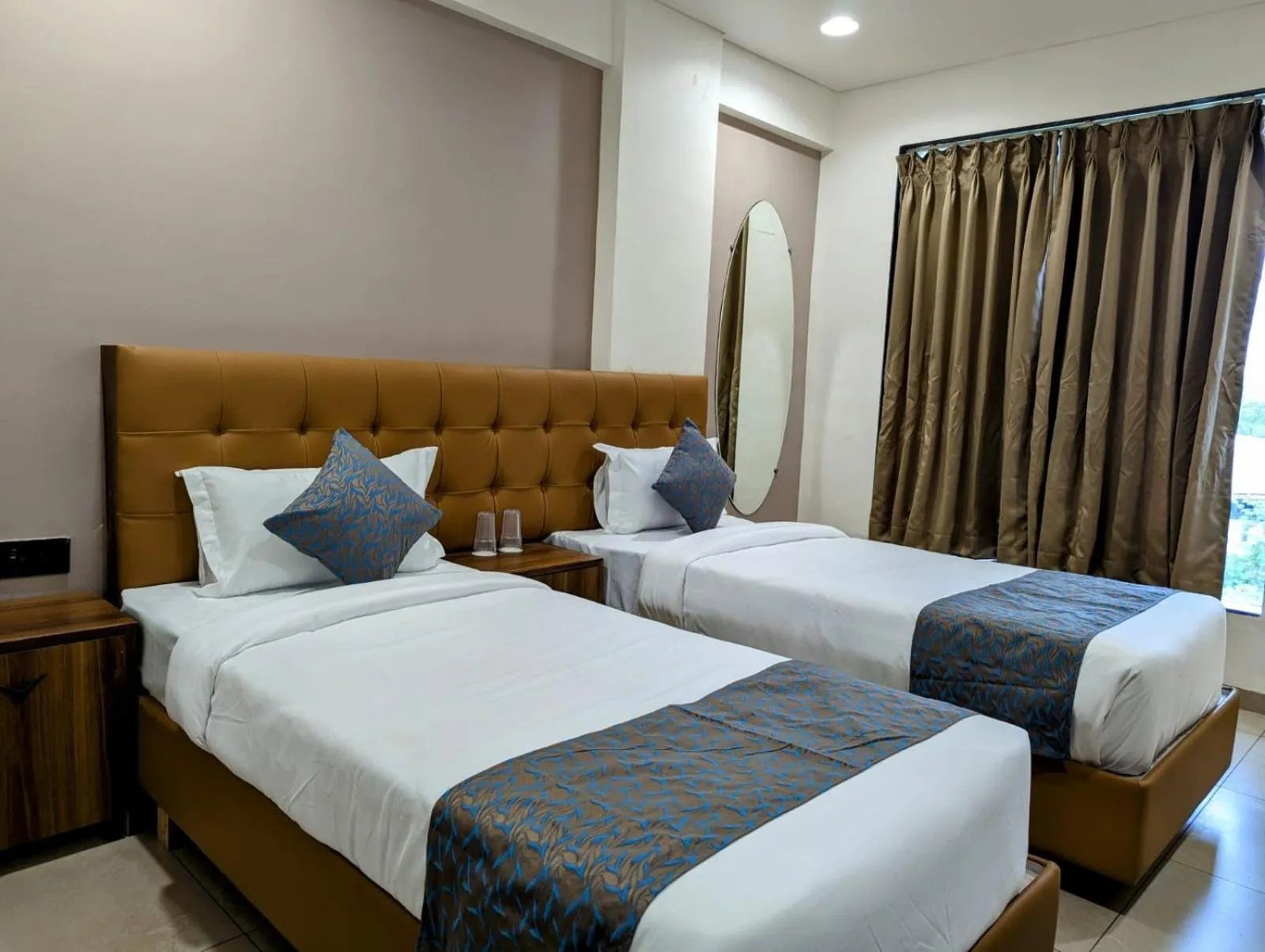 Bed in Hotel Majestic By NxtJen Hospitality