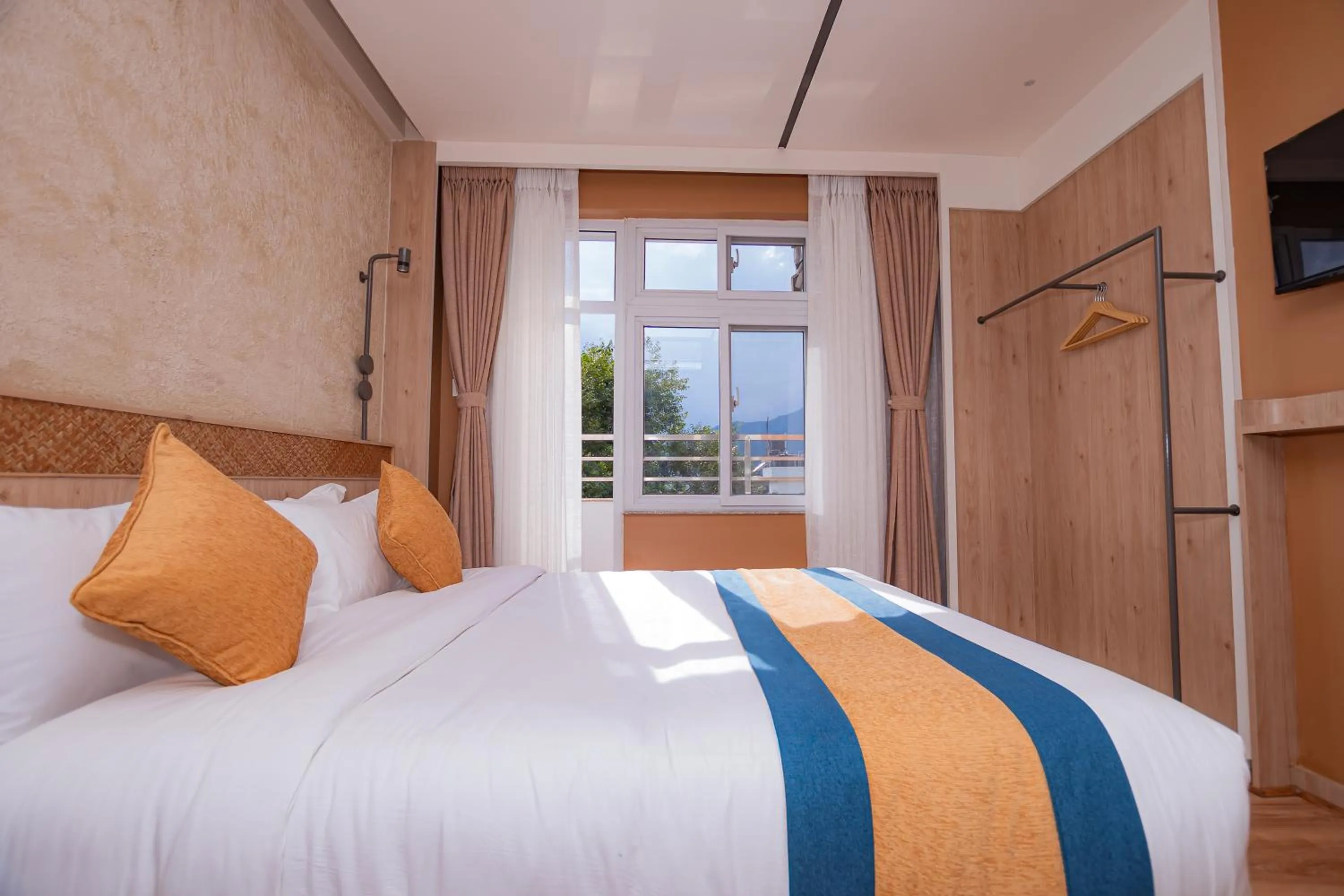 View (from property/room), Bed in Hotel Vistara