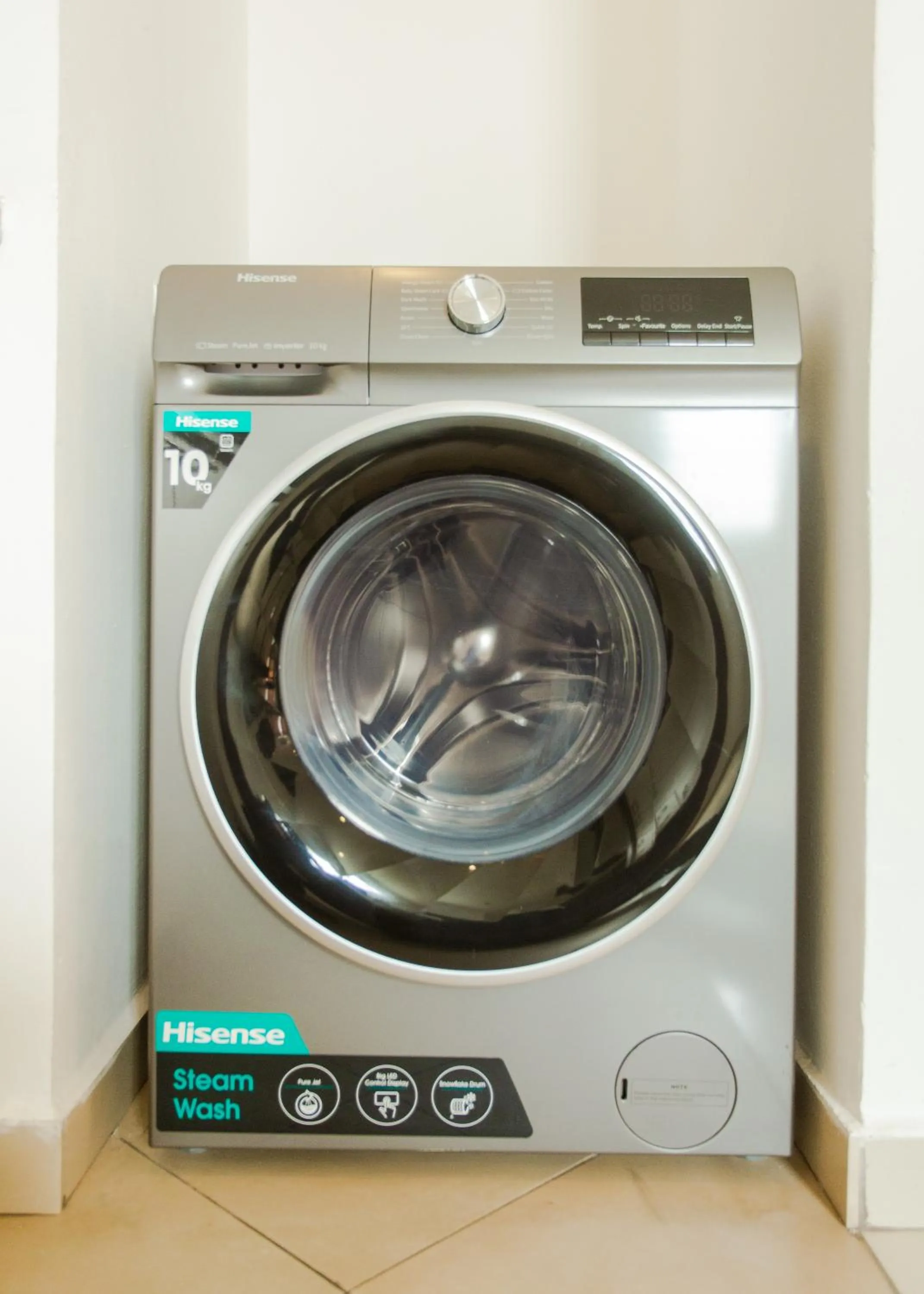 washing machine in Accra Luxury Apartments at Clifton Place
