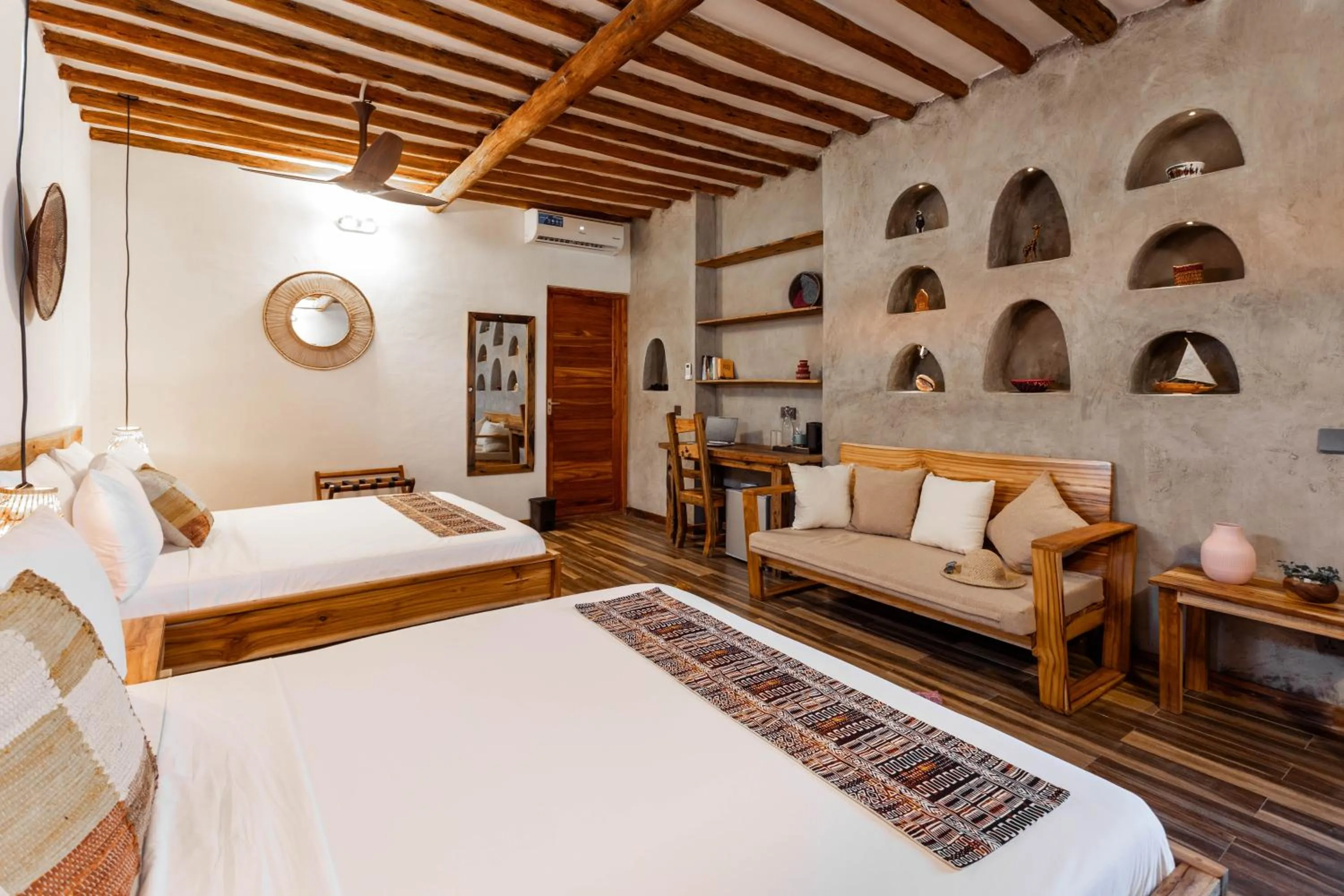 Bed in Casa Ananda Boutique Hotel