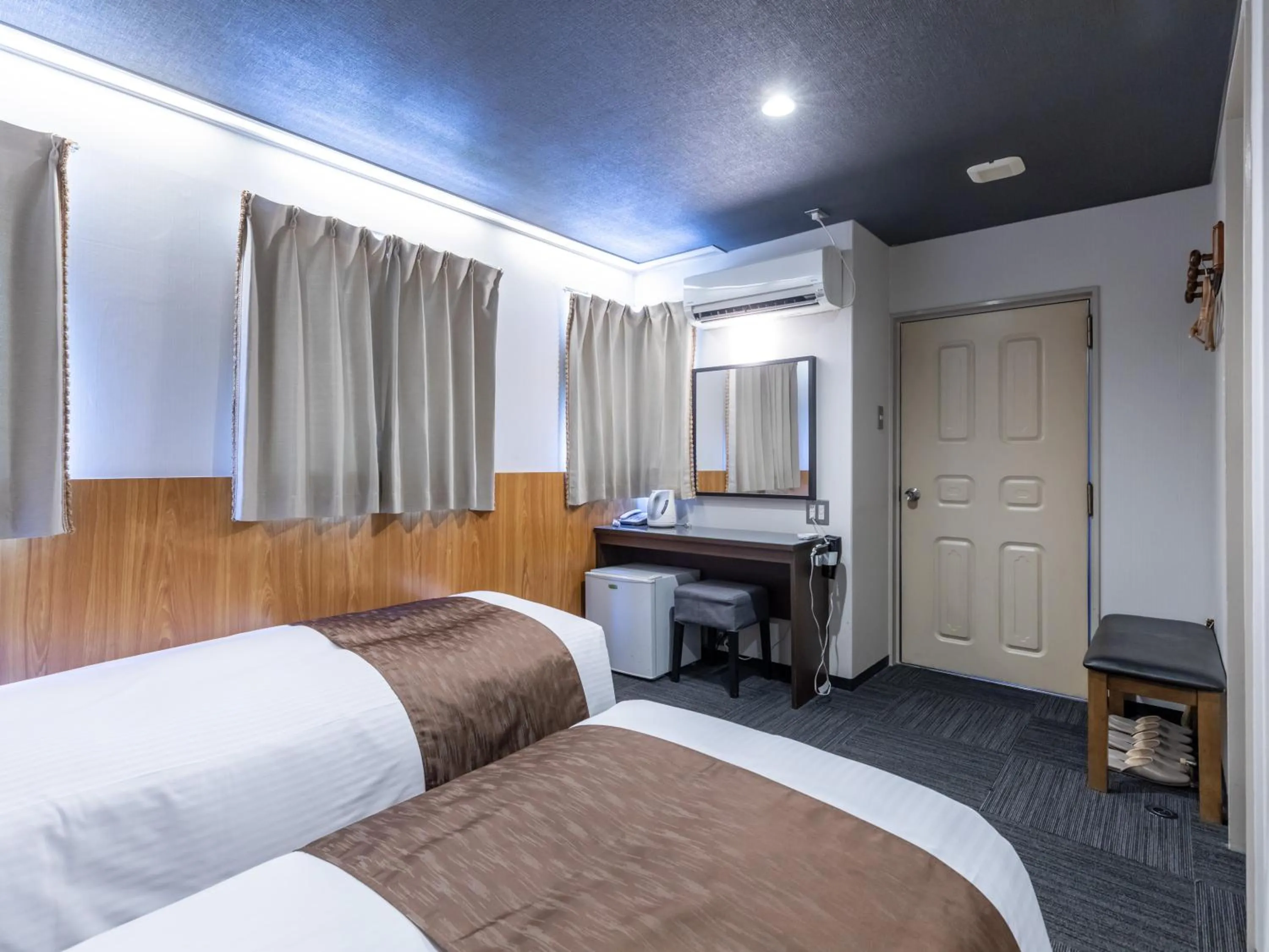 Bed in Tabist Takamatsu Pearl Hotel