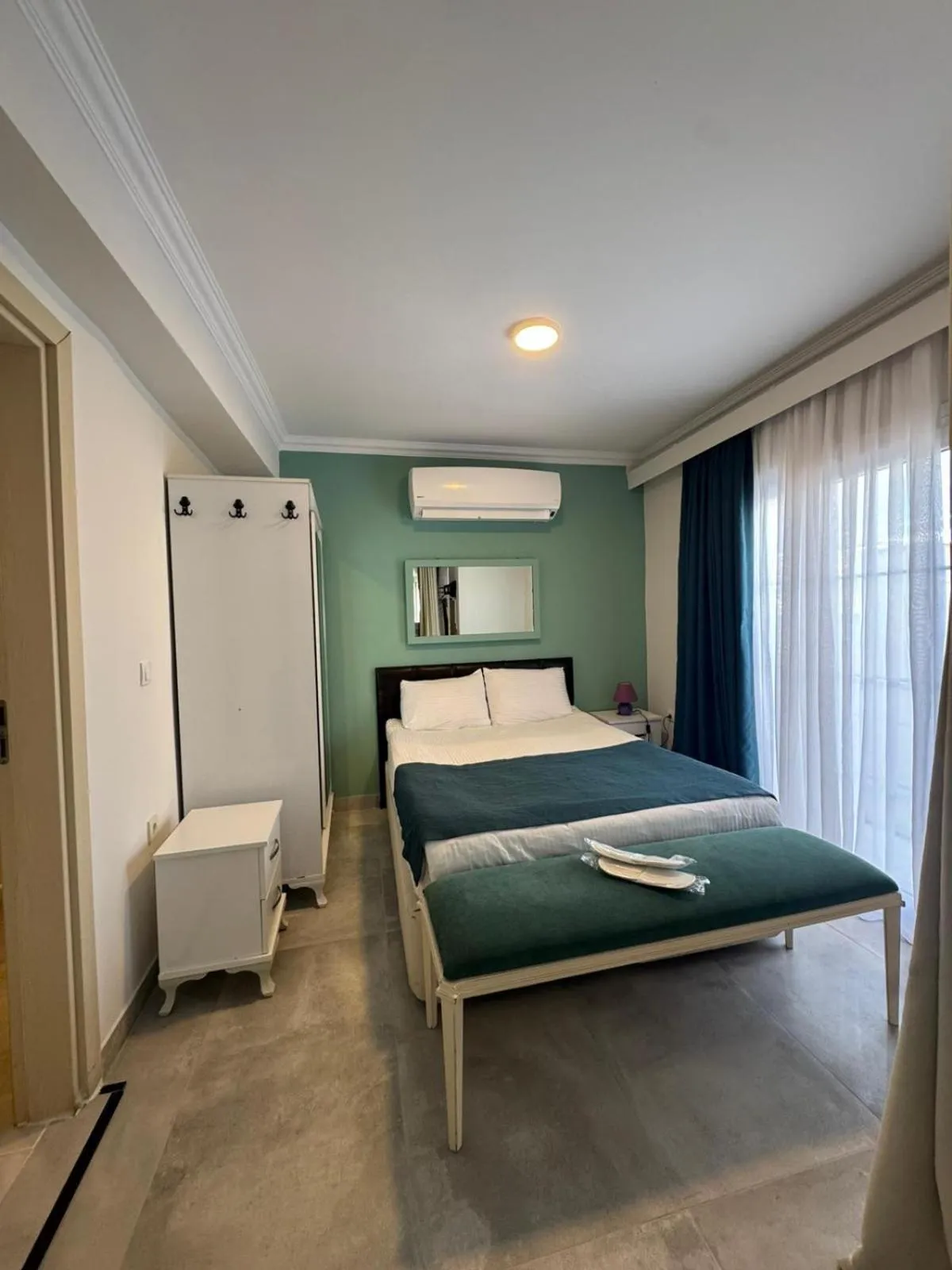 Bed in Mia Hill Suites