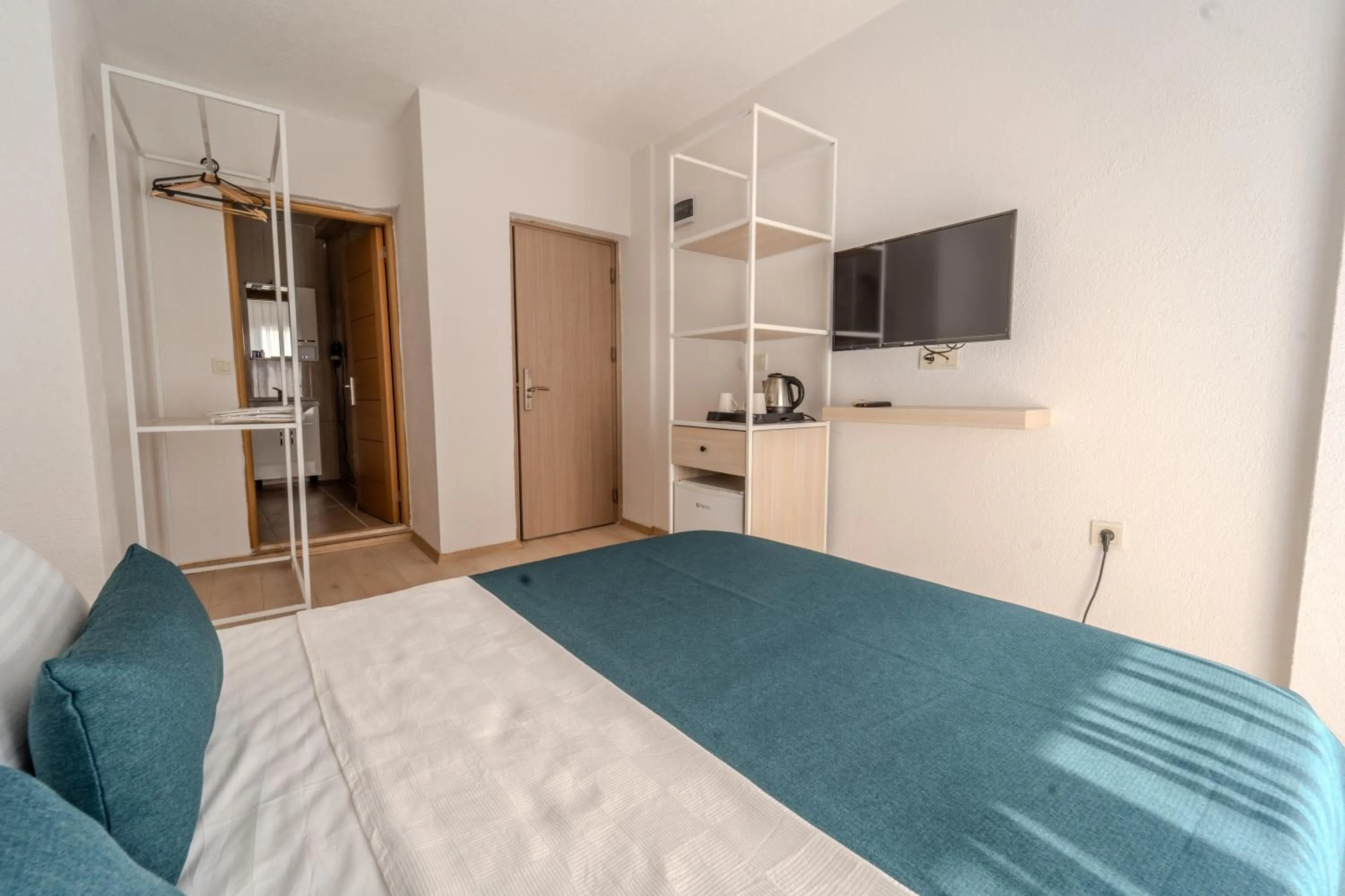 Bed in Mia Hill Suites