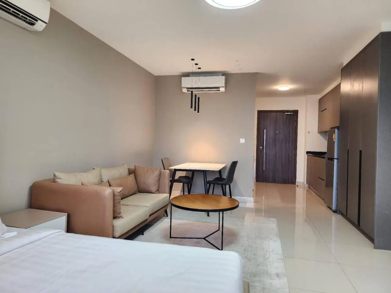 Bed in The PeAk Residence, Multi-Apartment by Emma