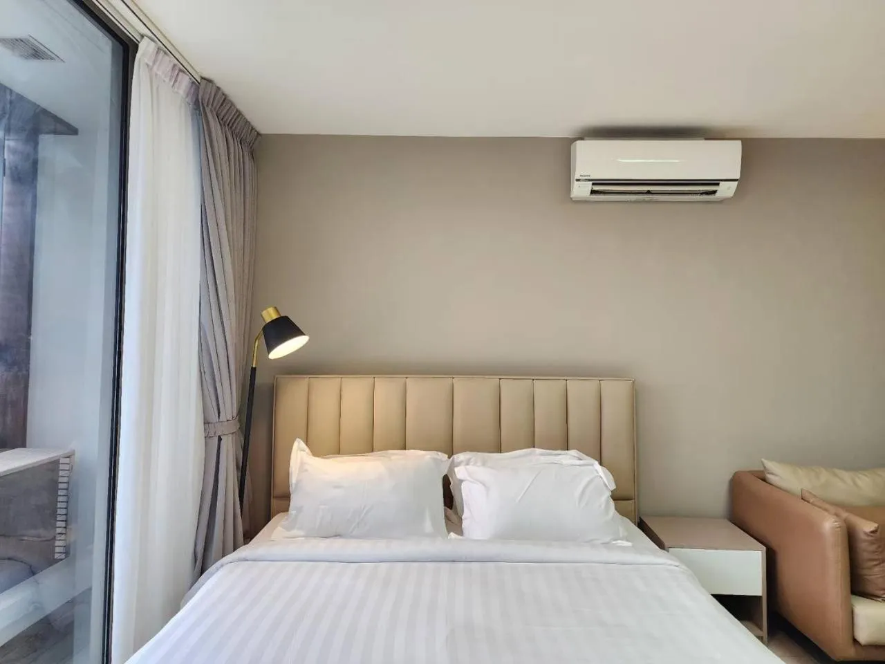 Bed in The PeAk Residence, Multi-Apartment by Emma