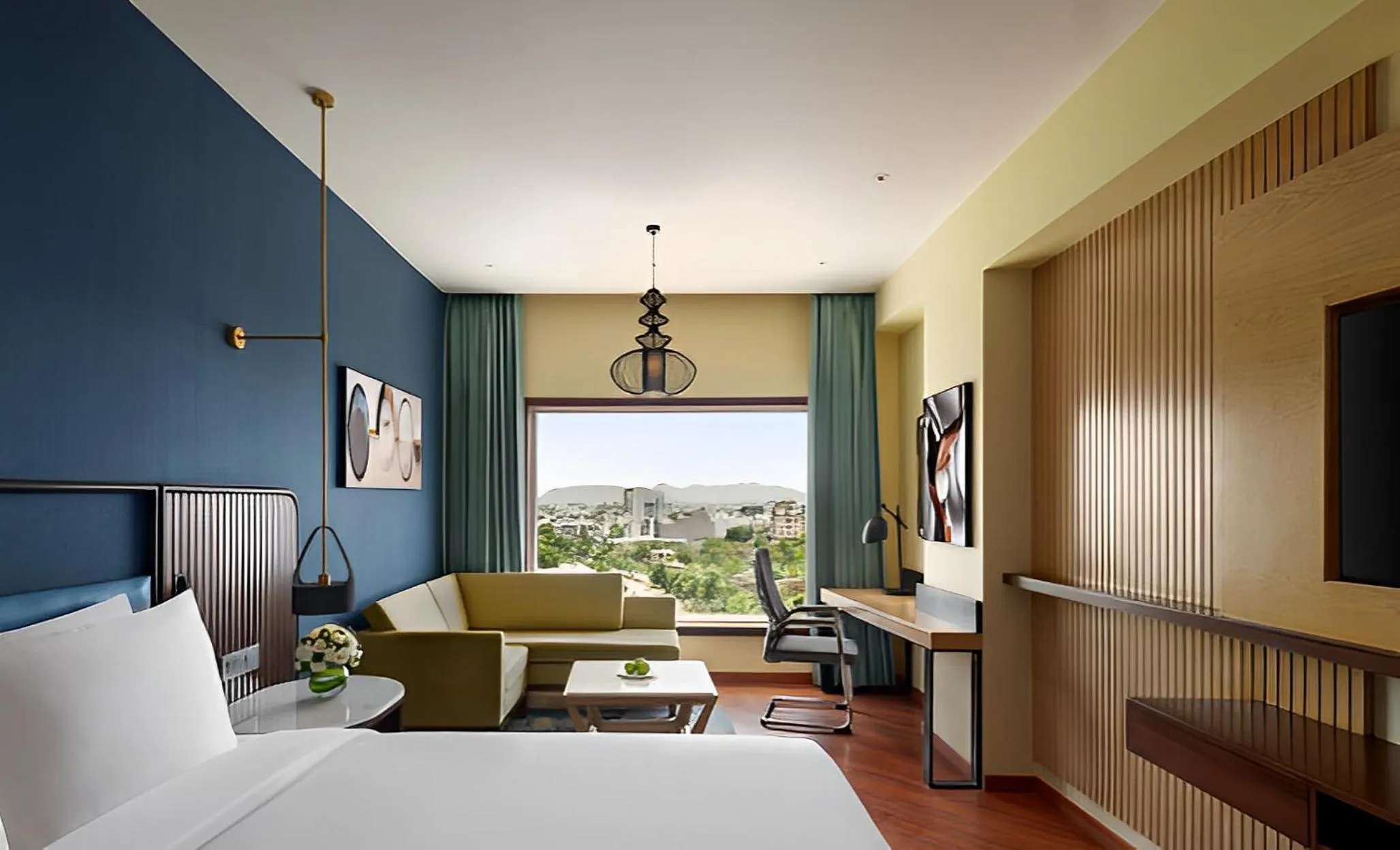 Bed in Ramada Encore by Wyndham Udaipur Roopnagar