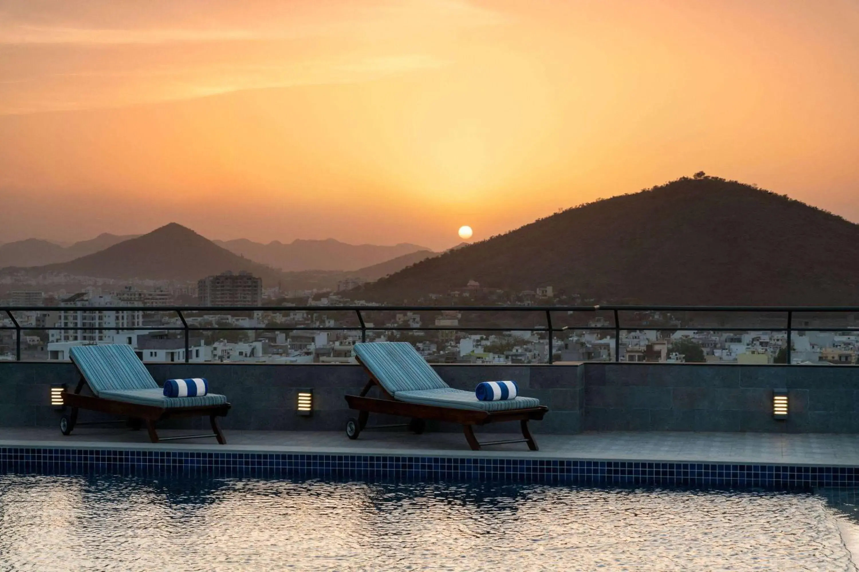 Swimming pool in Ramada Encore by Wyndham Udaipur Roopnagar Swimming pool in Ramada Encore by Wyndham Udaipur Roopnagar