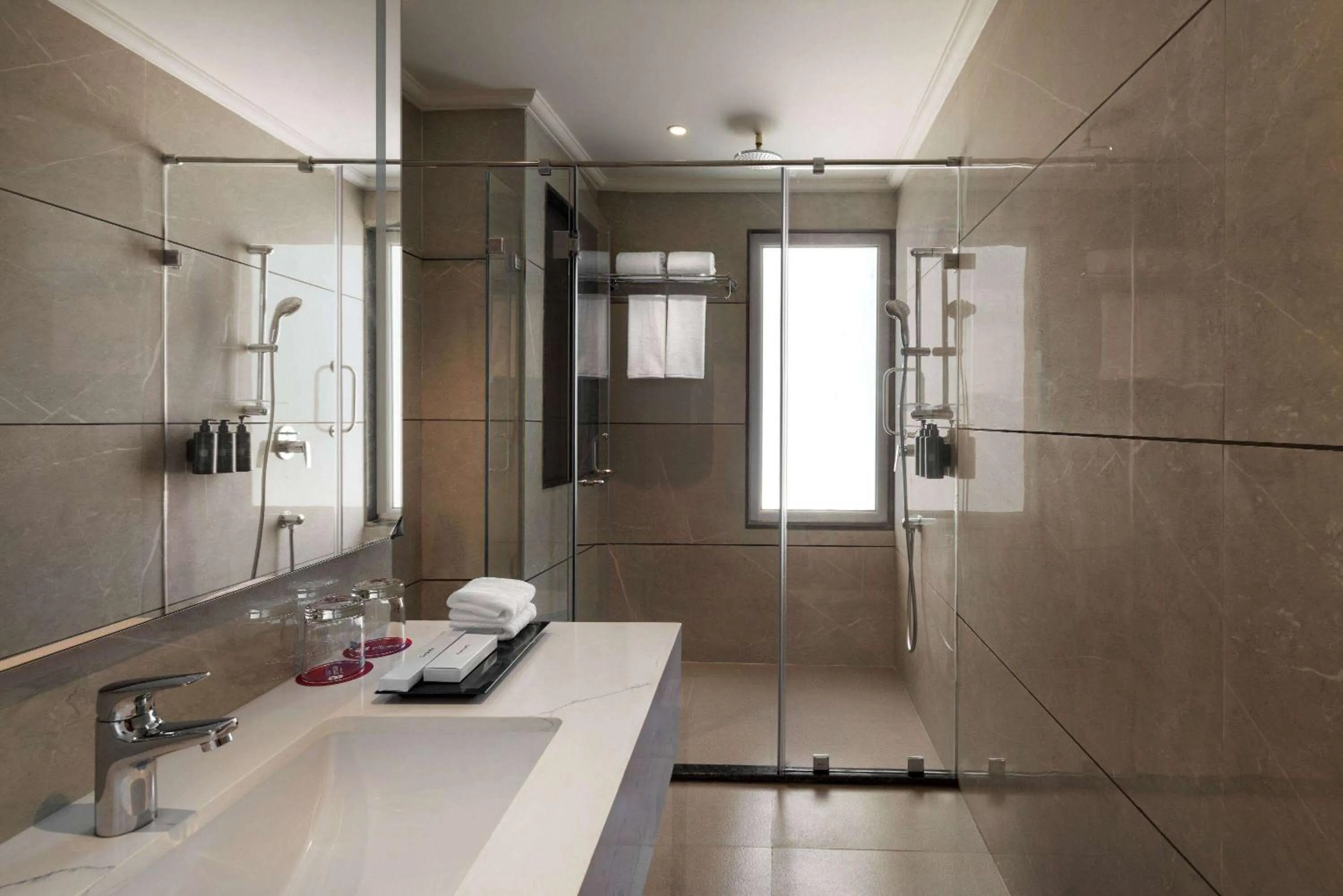 Bathroom in Ramada Encore by Wyndham Udaipur Roopnagar