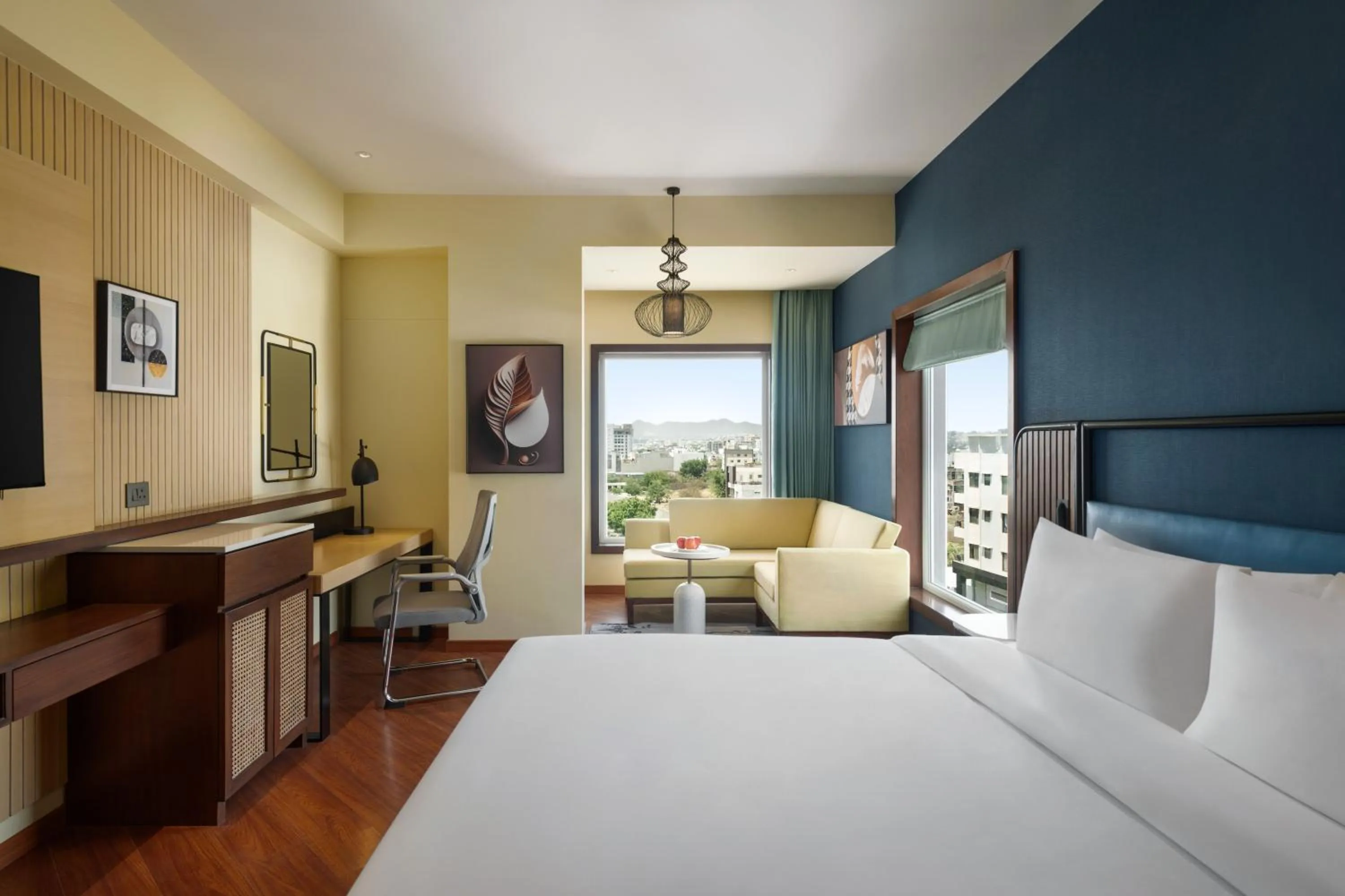 Bed in Ramada Encore by Wyndham Udaipur Roopnagar