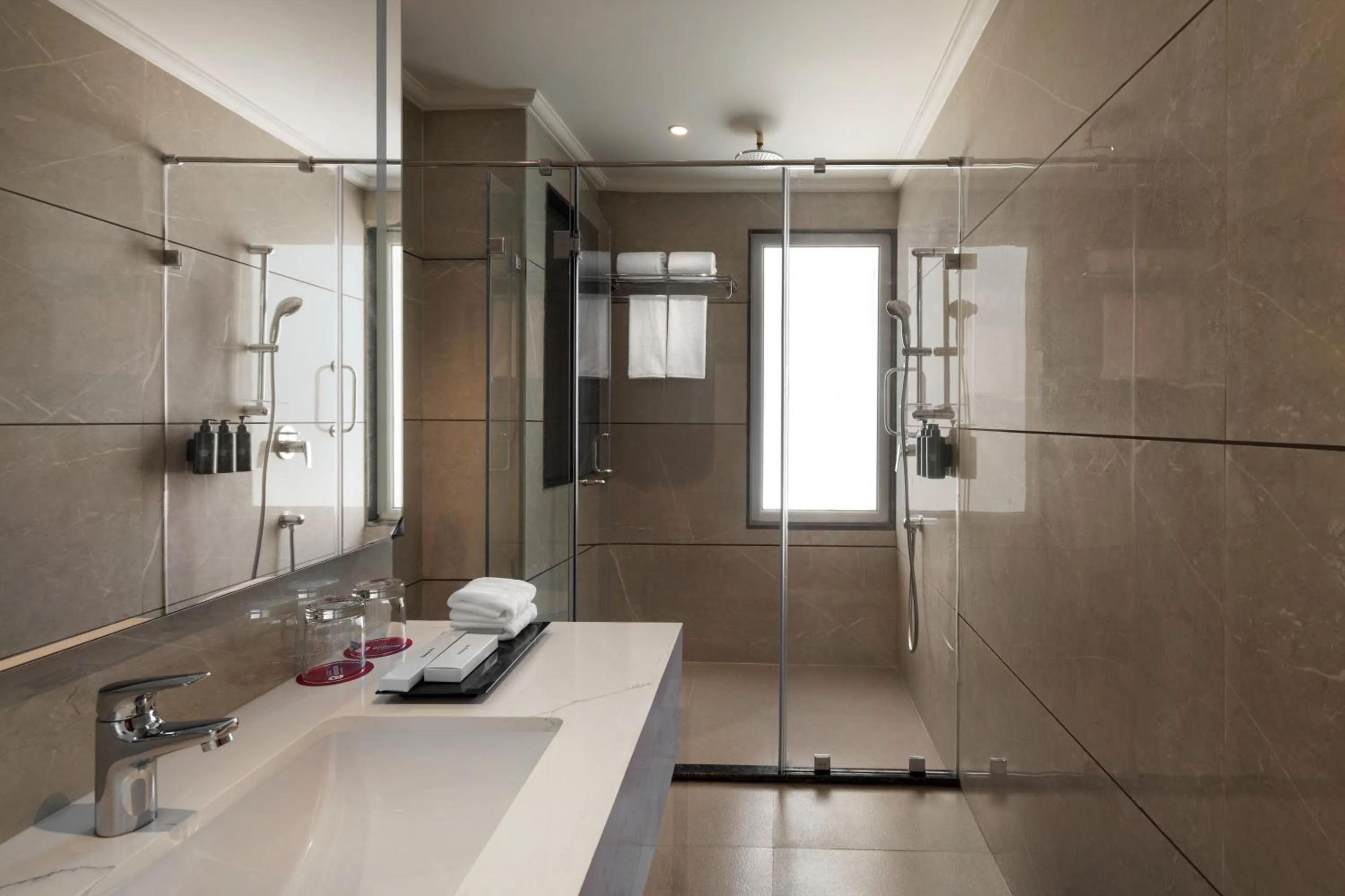 Shower in Ramada Encore by Wyndham Udaipur Roopnagar