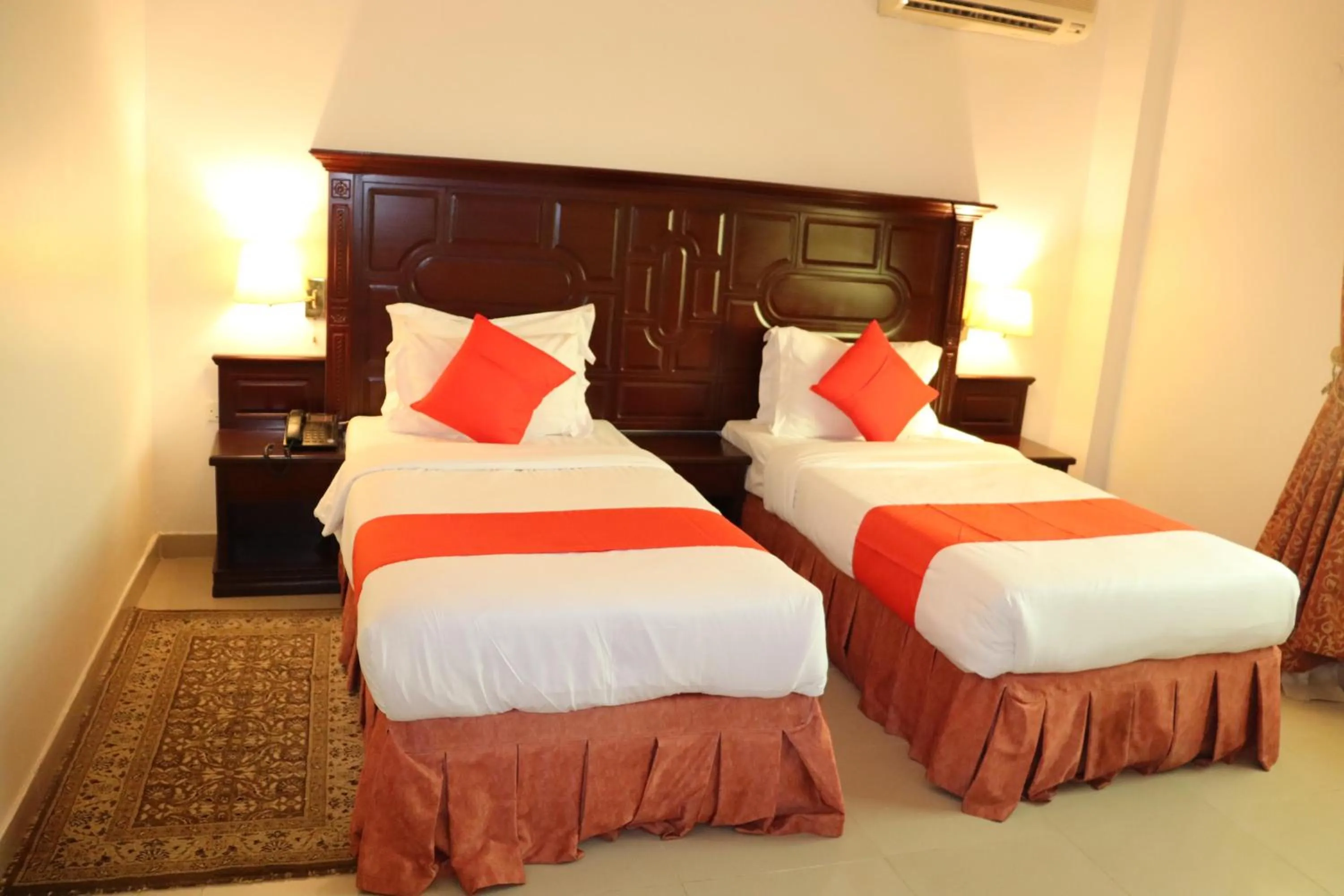 Bed in Dahlia Sohar Hotel Apartments