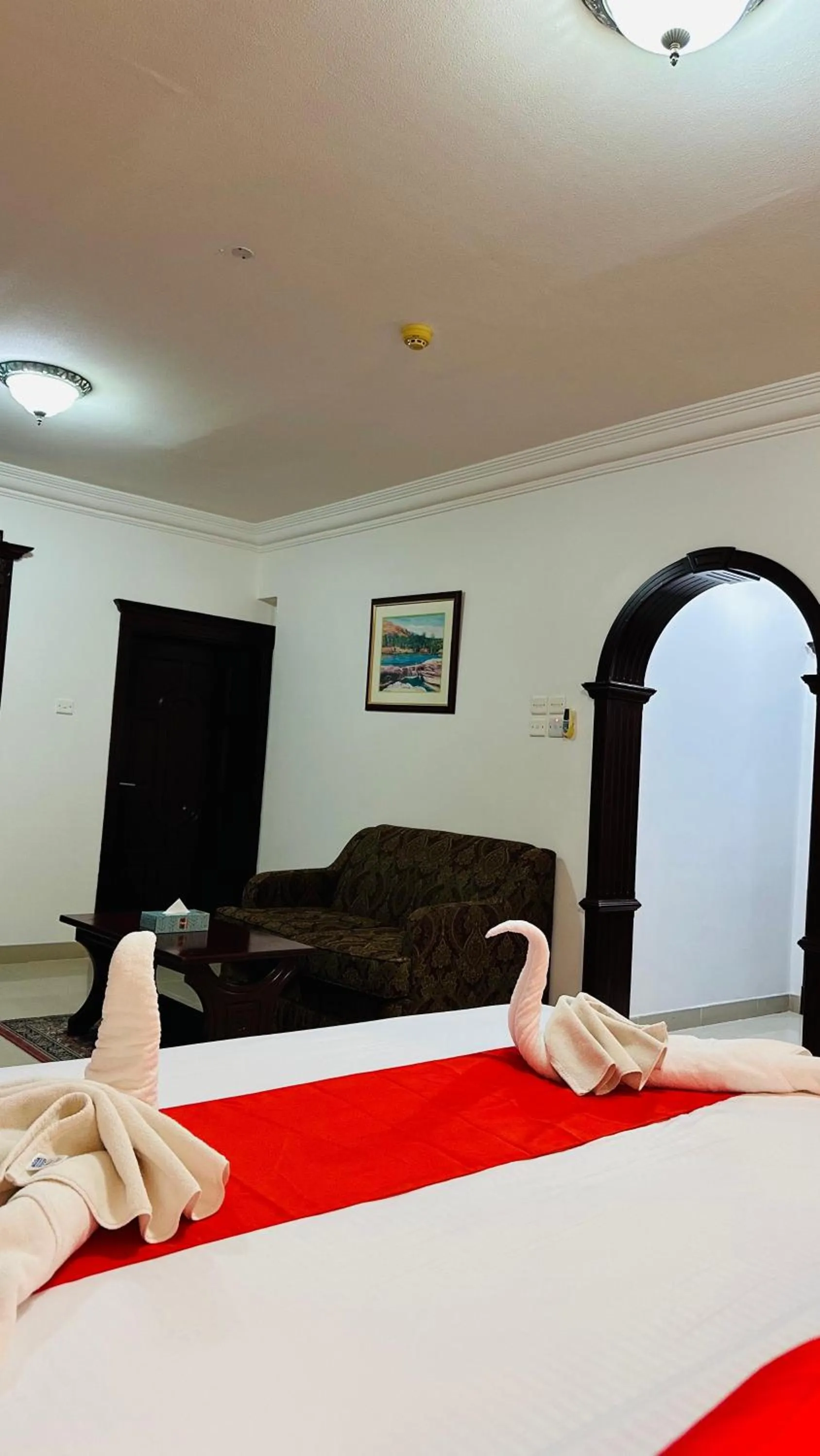 Bed in Dahlia Sohar Hotel Apartments
