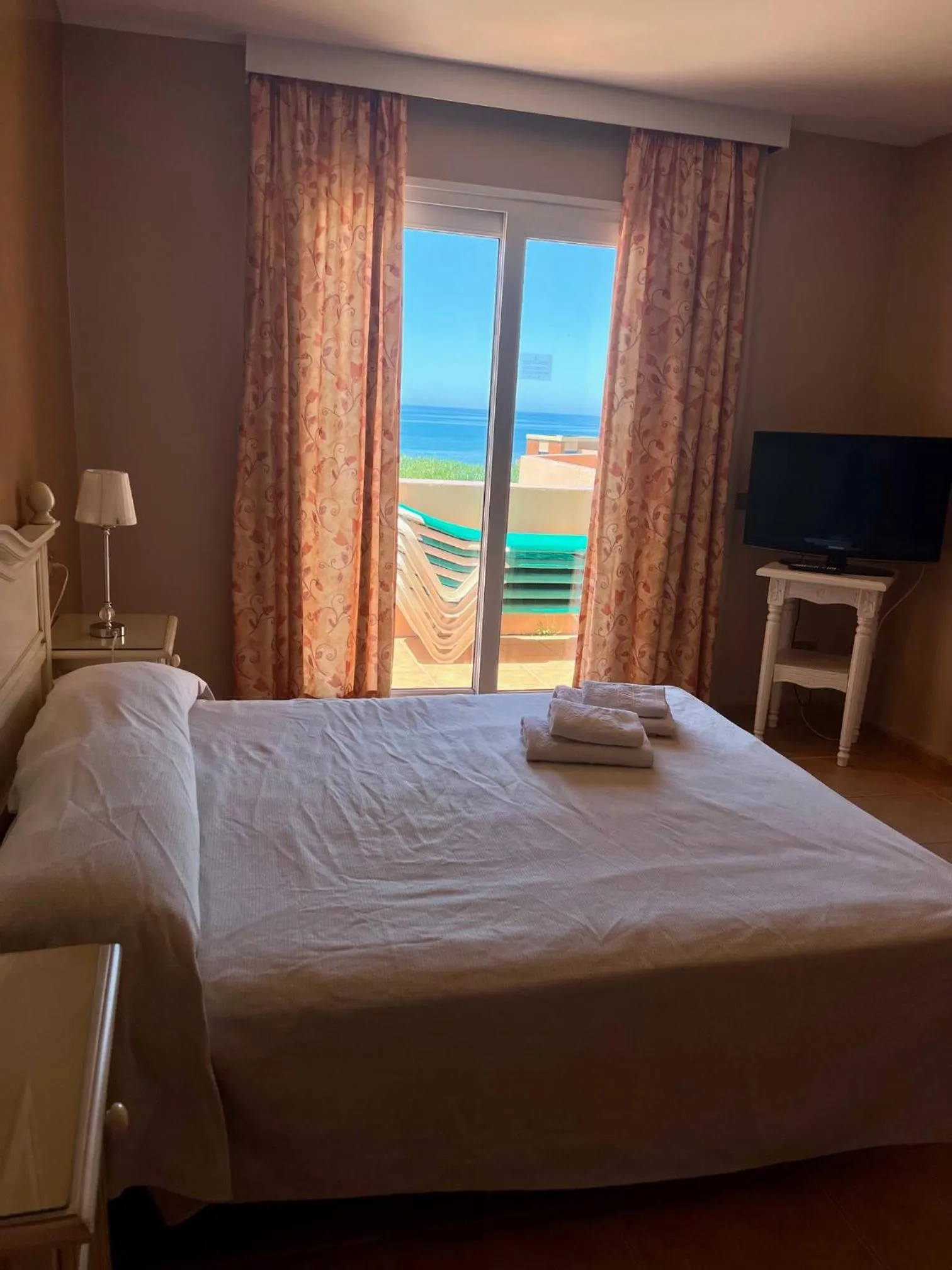 Bed in Marbella Beach Resort at Club Playa Real