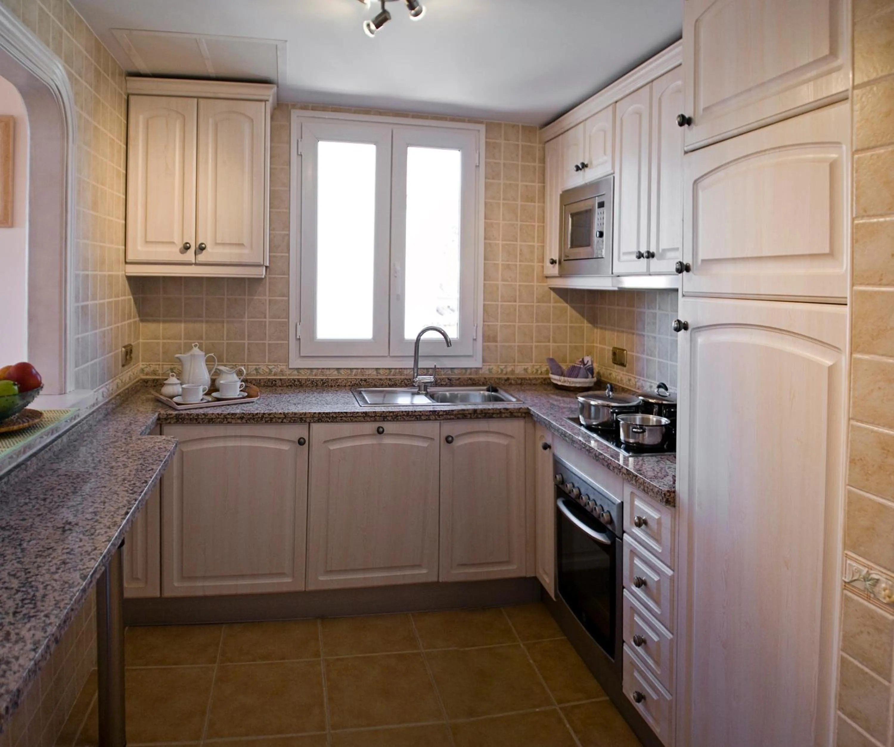 Kitchen or kitchenette in Marbella Beach Resort at Club Playa Real