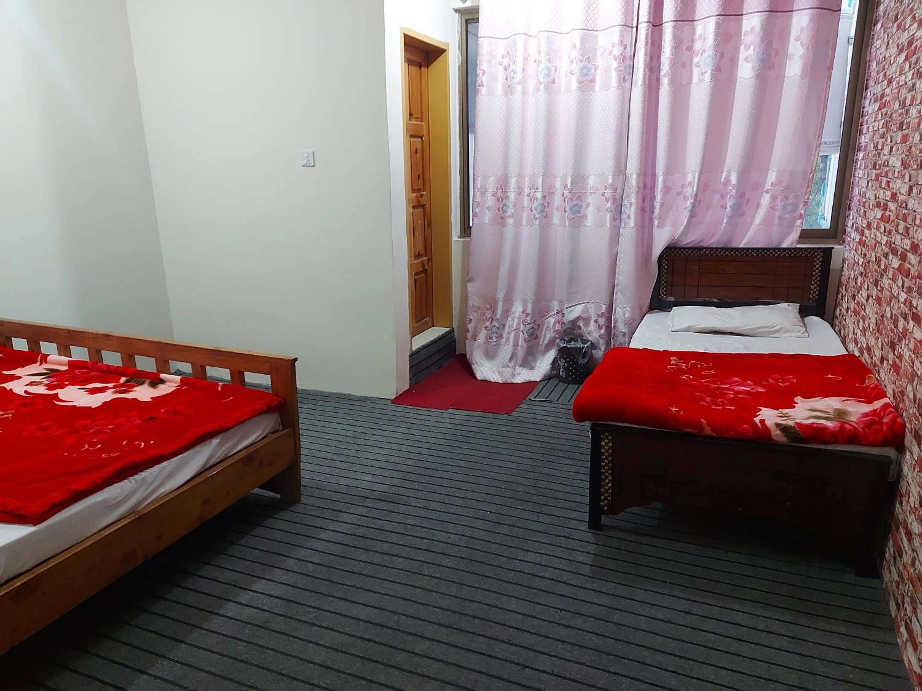 Bed in Yak Sarai Hotel & Restaurant