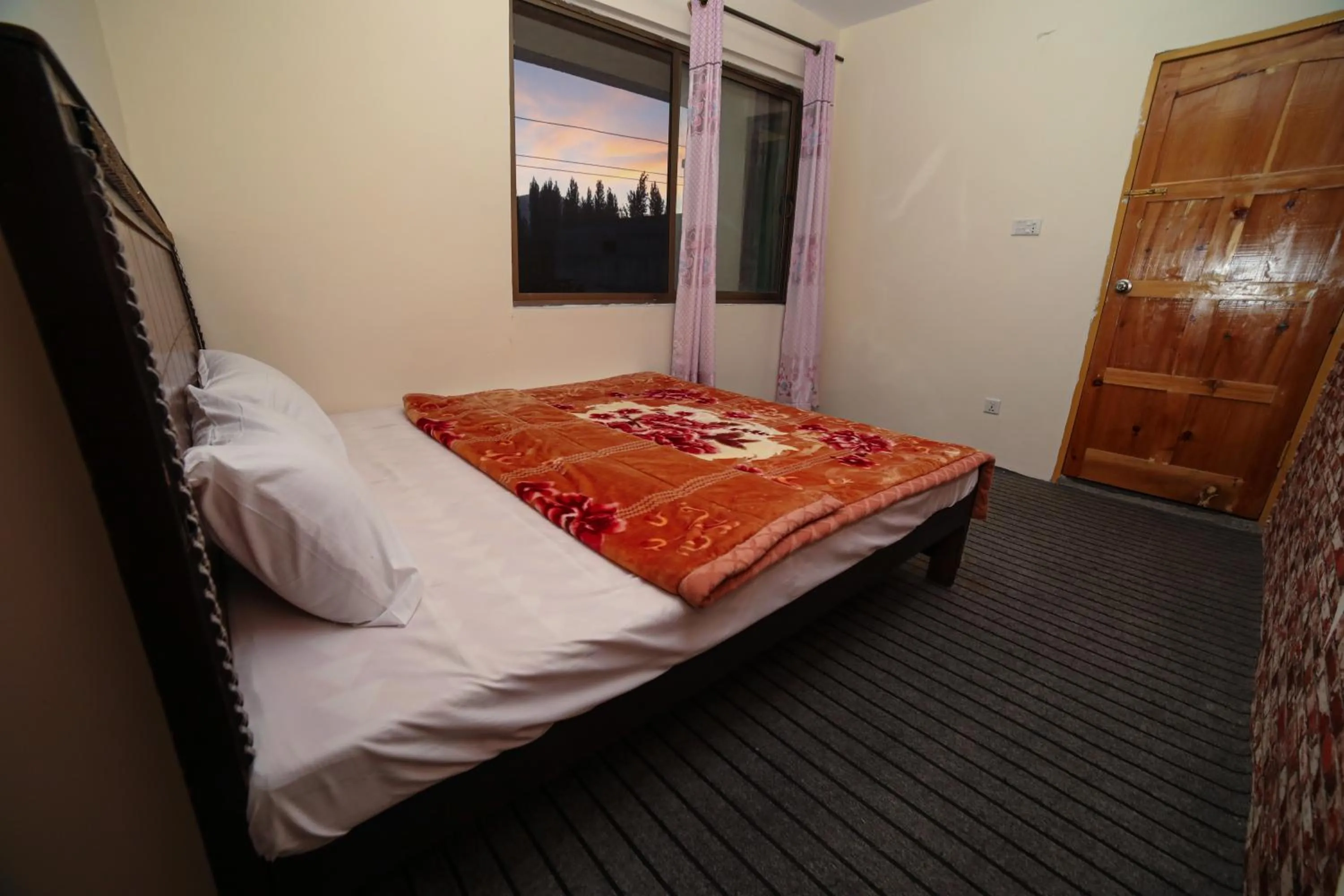 Bed in Yak Sarai Hotel & Restaurant