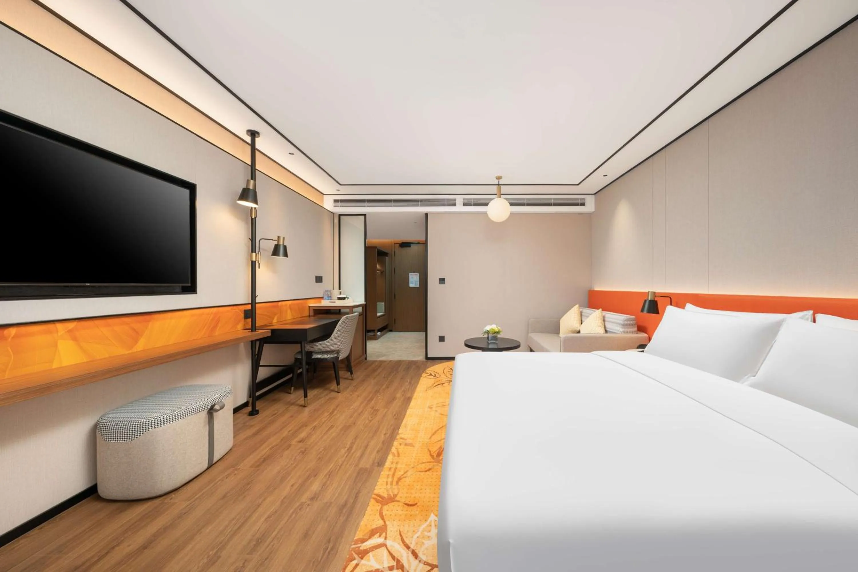Living room, Bed in Hilton Garden Inn Tianjin Railway Station