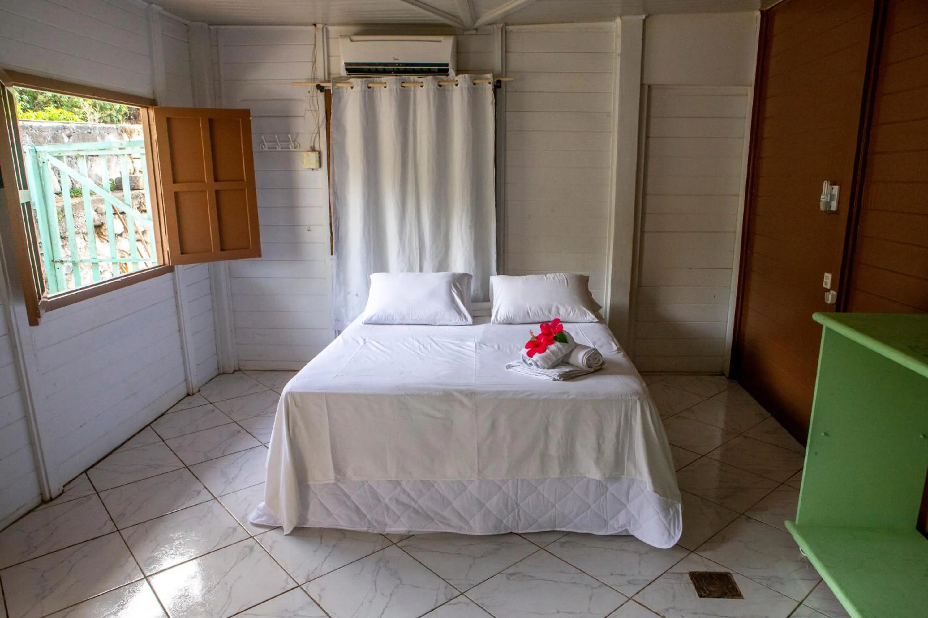 Bed in Pousada Sol e Mar Noronha