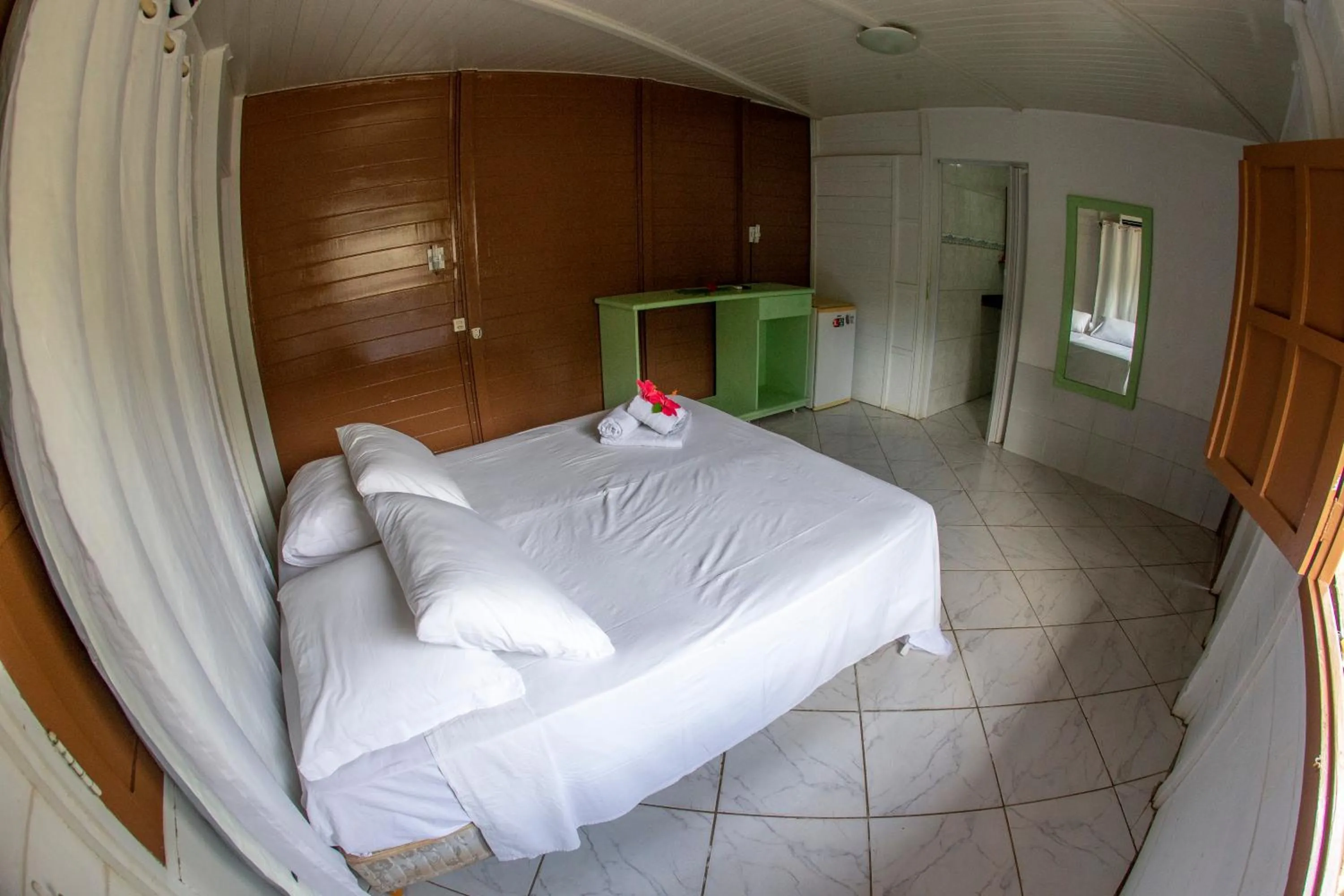 Bed in Pousada Sol e Mar Noronha