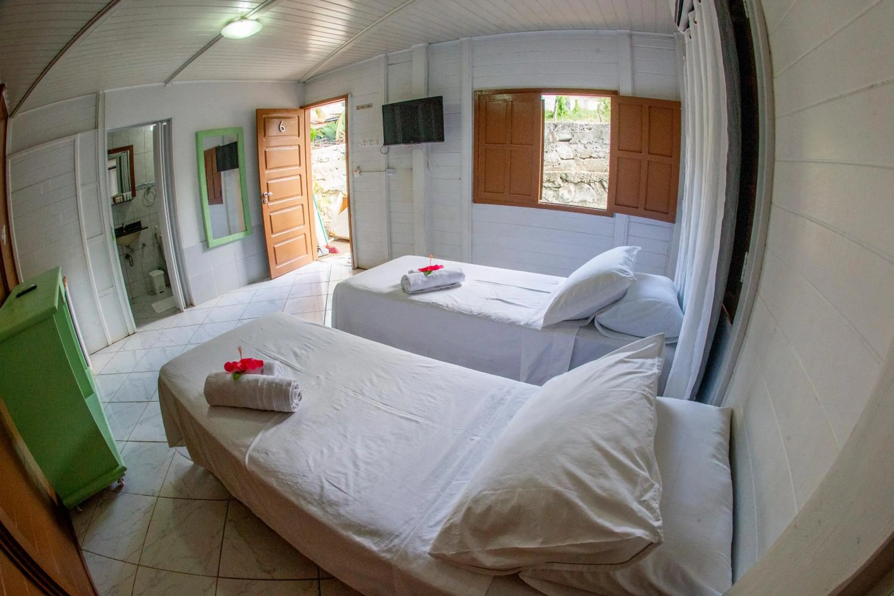 Bed in Pousada Sol e Mar Noronha