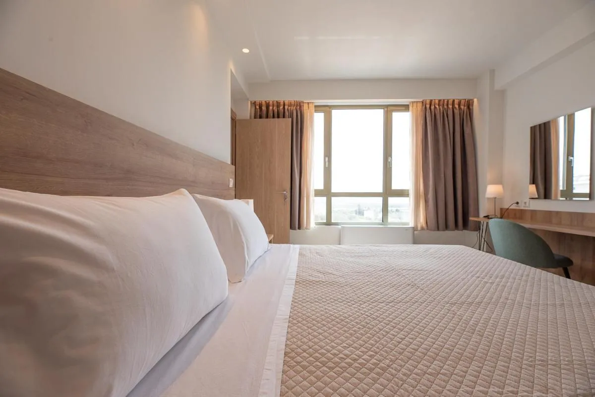 Quadruple Room with Terrace in ALPHA APARTMENTS Free Shuttle from and to the Airport