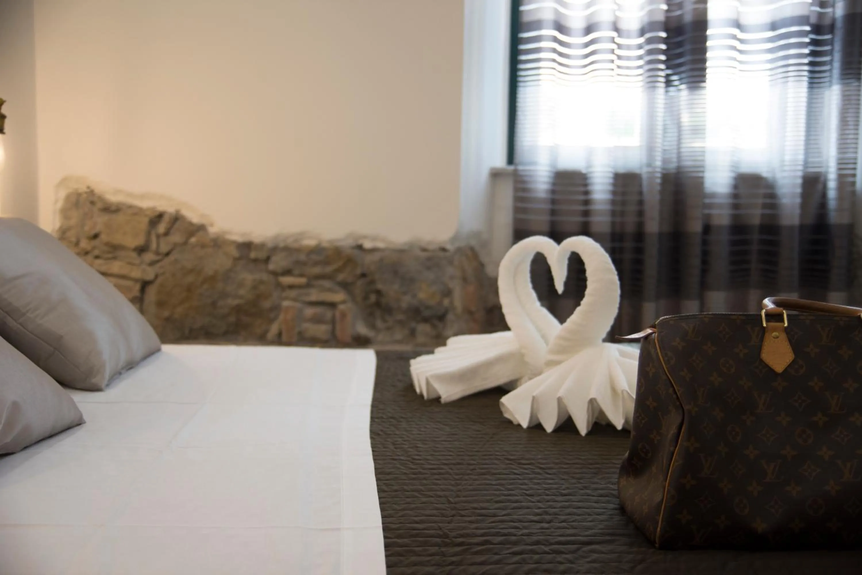 Decorative detail, Bed in Passi di Mare Rooms