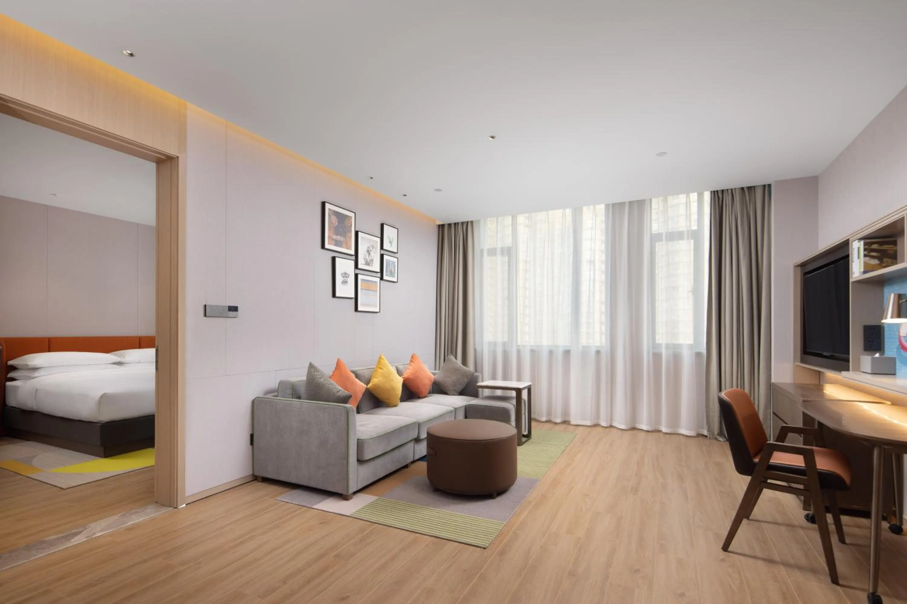 Living room, Bed in Home2 Suite by Hilton Hangzhou Qianjiang New Town