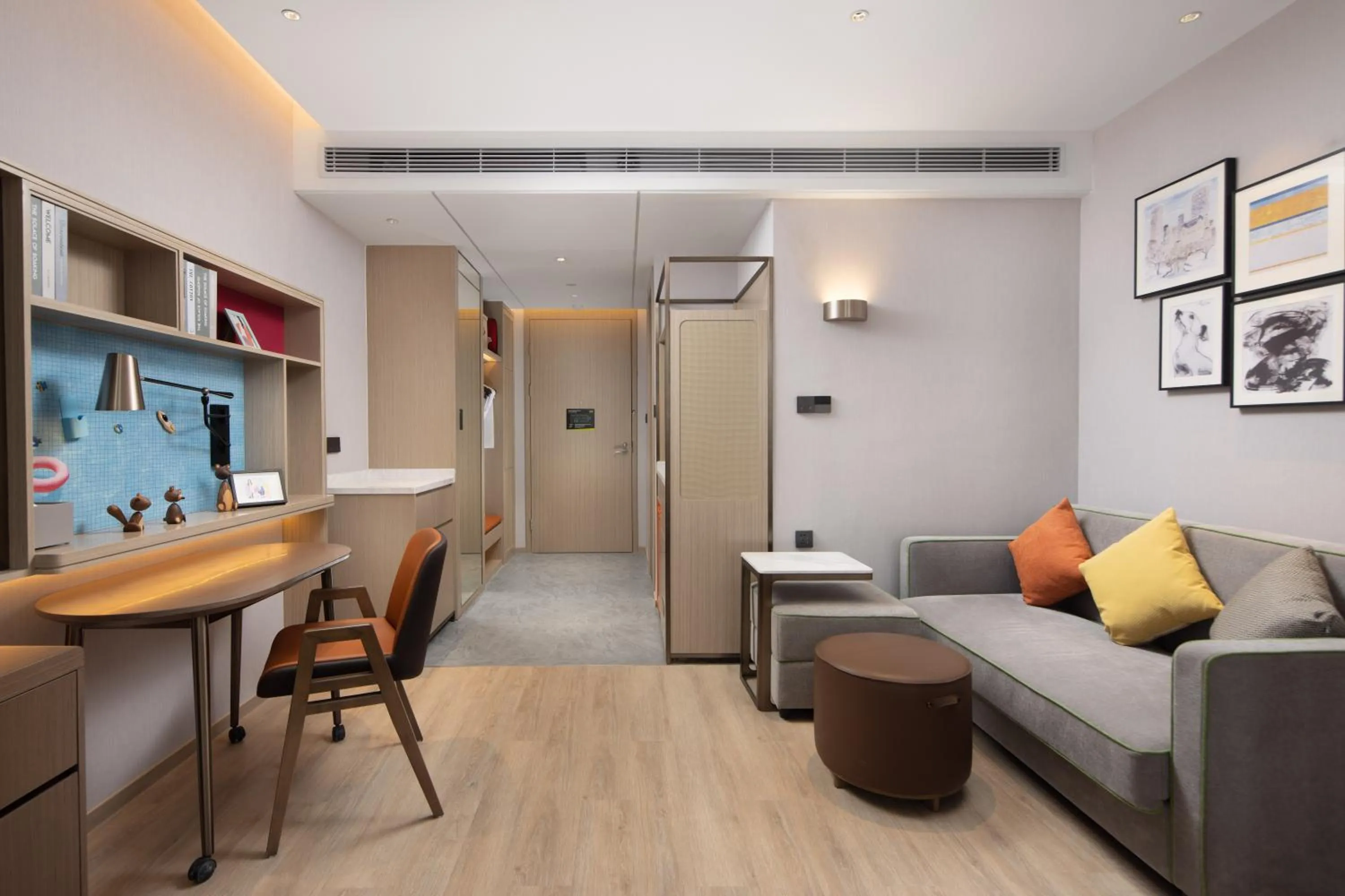 Living room in Home2 Suite by Hilton Hangzhou Qianjiang New Town