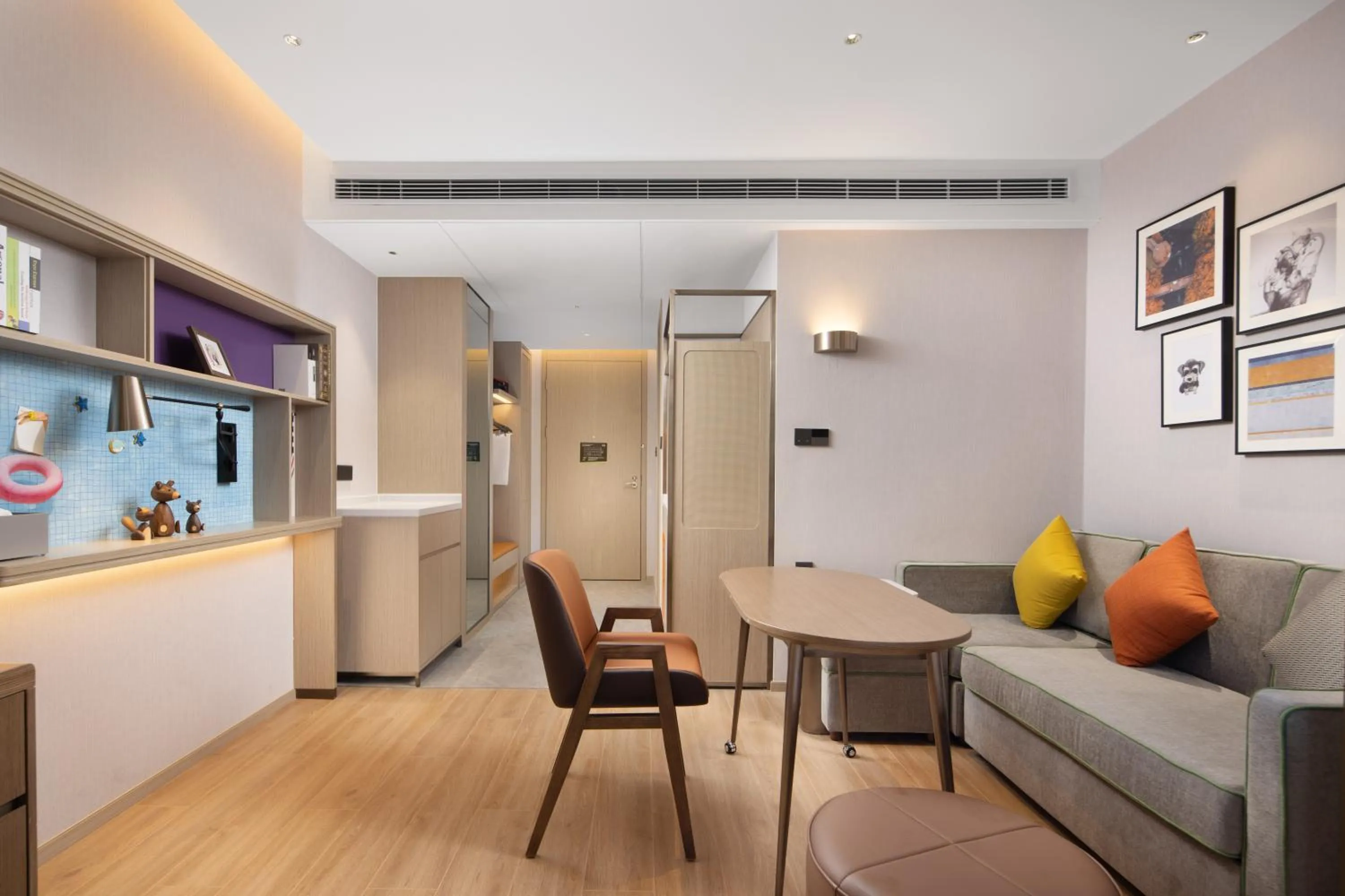 Living room in Home2 Suite by Hilton Hangzhou Qianjiang New Town