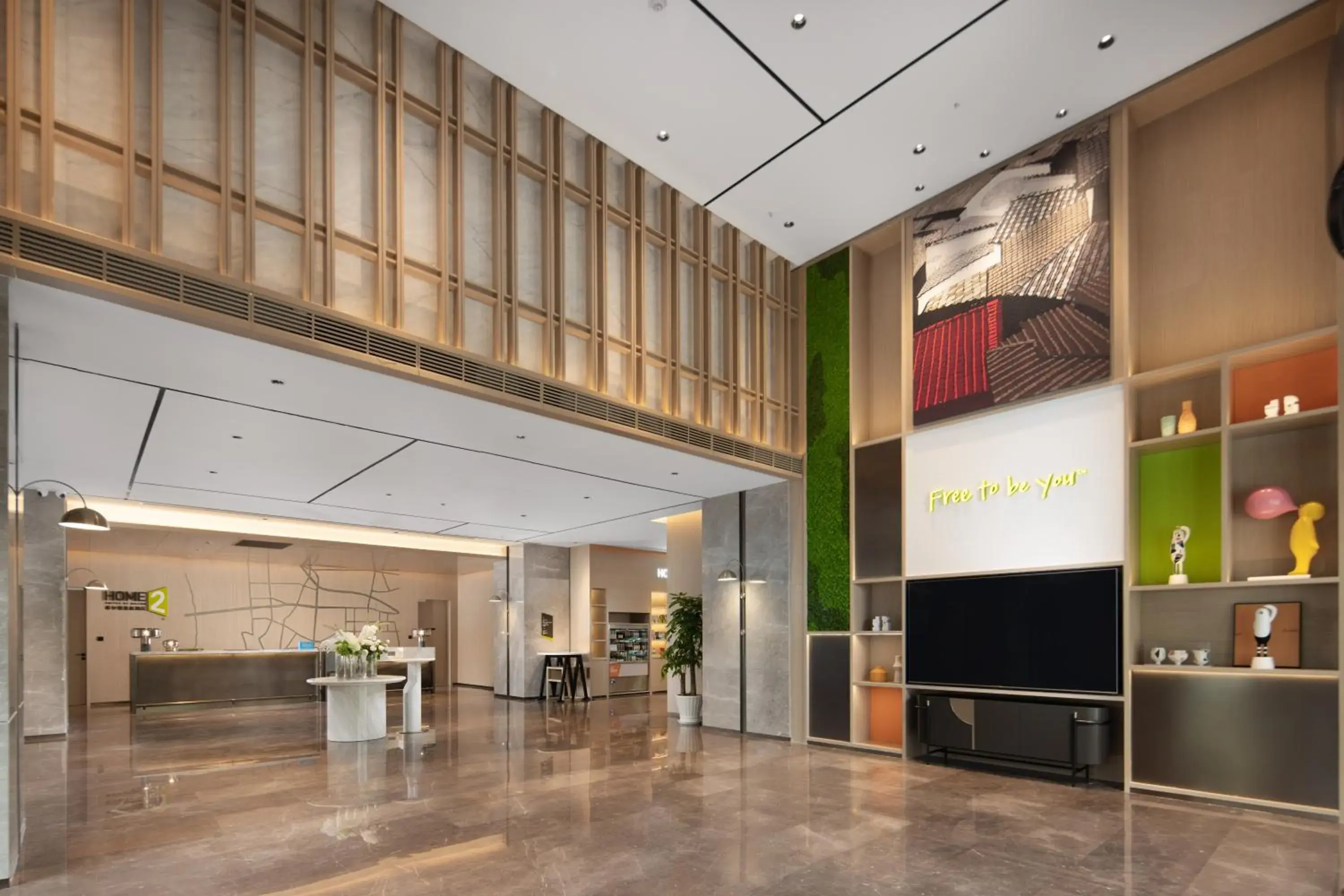 Lobby or reception in Home2 Suite by Hilton Hangzhou Qianjiang New Town Lobby or reception in Home2 Suite by Hilton Hangzhou Qianjiang New Town
