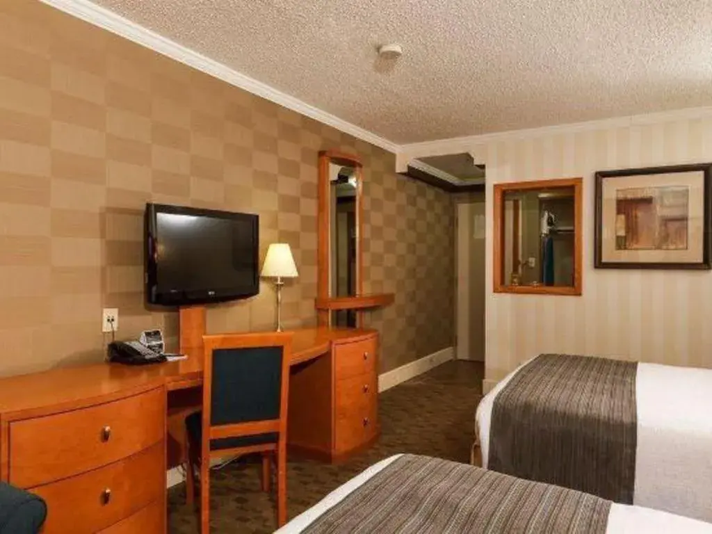 Bed in The Glenmore Inn & Convention Centre Bed in The Glenmore Inn & Convention Centre