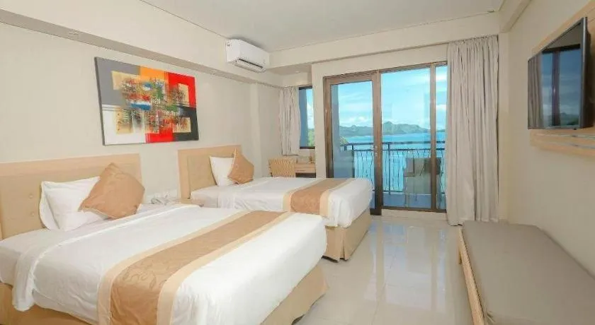 Bed in Laprima Hotel