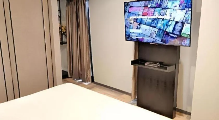 Bed in First Pride Hotel Bangkok