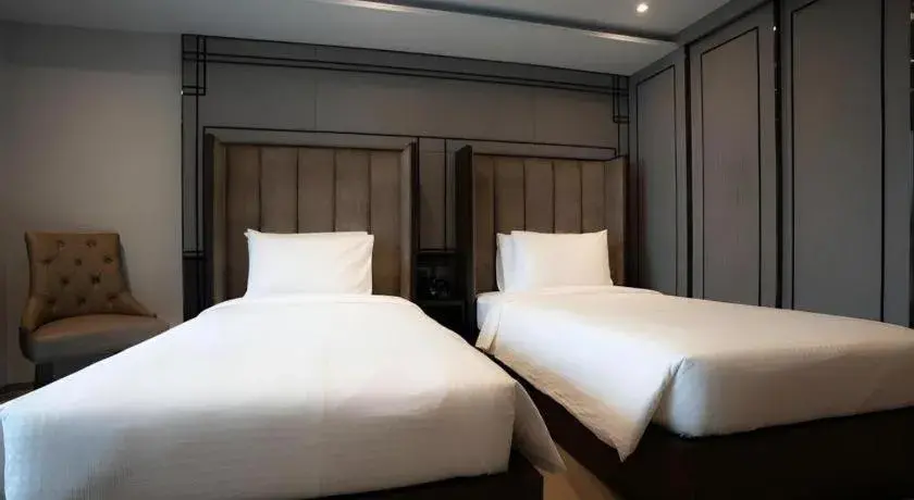 Bed in First Pride Hotel Bangkok Bed in First Pride Hotel Bangkok