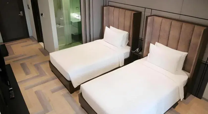 Bed in First Pride Hotel Bangkok Bed in First Pride Hotel Bangkok