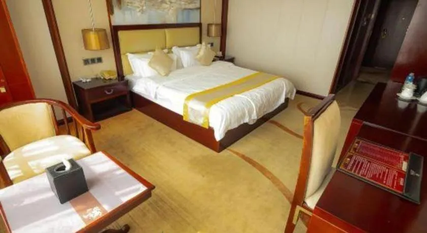 Bed in Grand Szechuan Hotel Vientiane