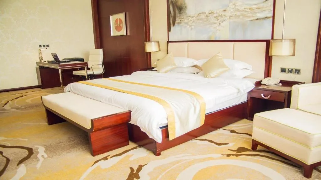Bed in Grand Szechuan Hotel Vientiane