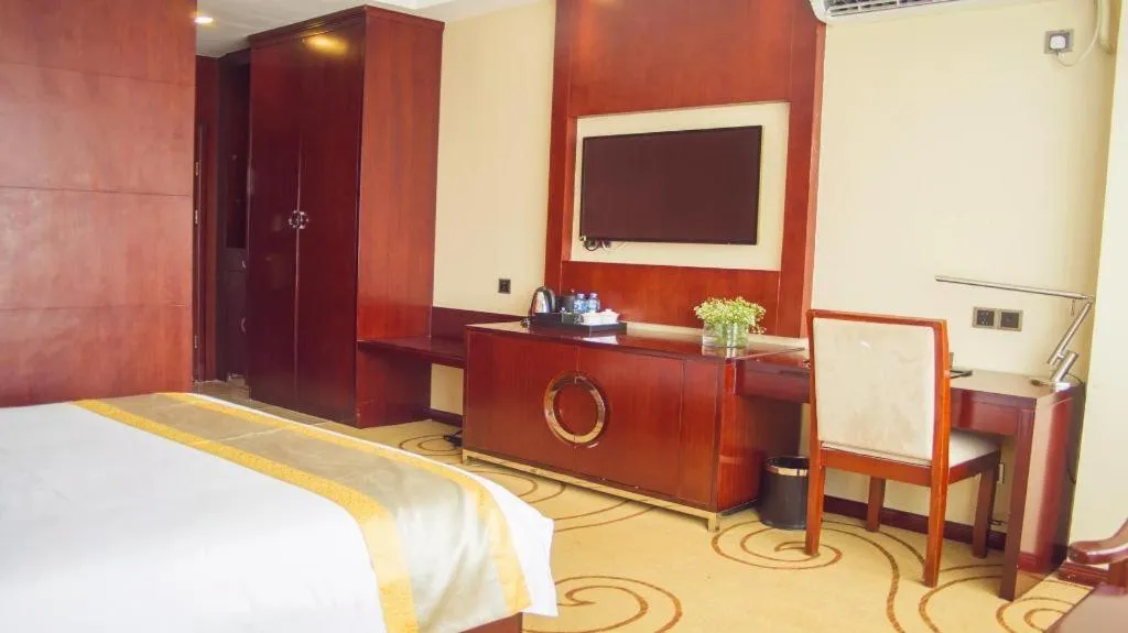 Bed in Grand Szechuan Hotel Vientiane