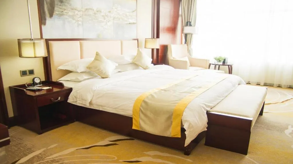 Bed in Grand Szechuan Hotel Vientiane