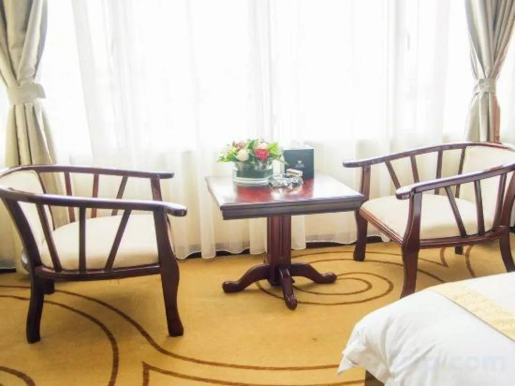 Bed in Grand Szechuan Hotel Vientiane