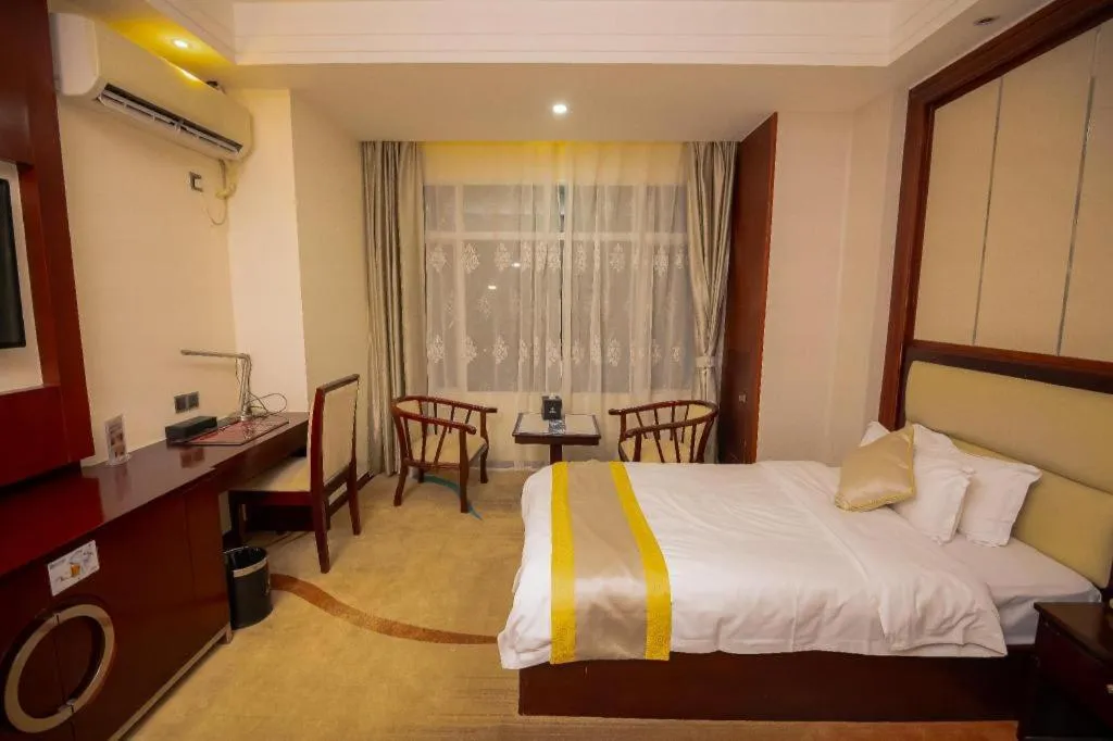 Bed in Grand Szechuan Hotel Vientiane