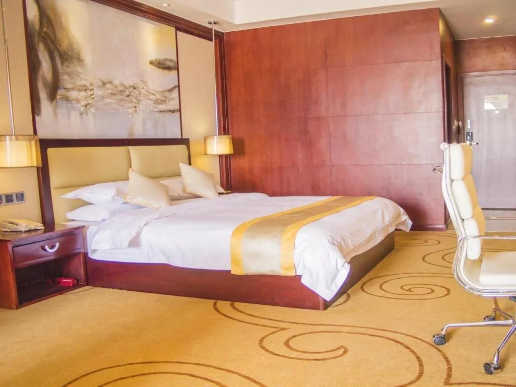 Bed in Grand Szechuan Hotel Vientiane