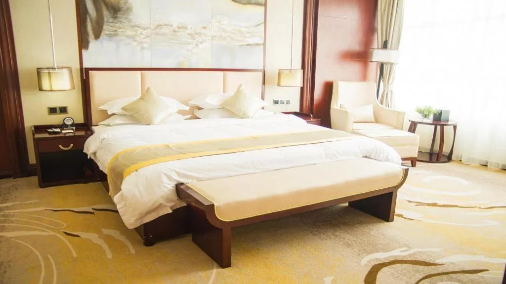 Bed in Grand Szechuan Hotel Vientiane